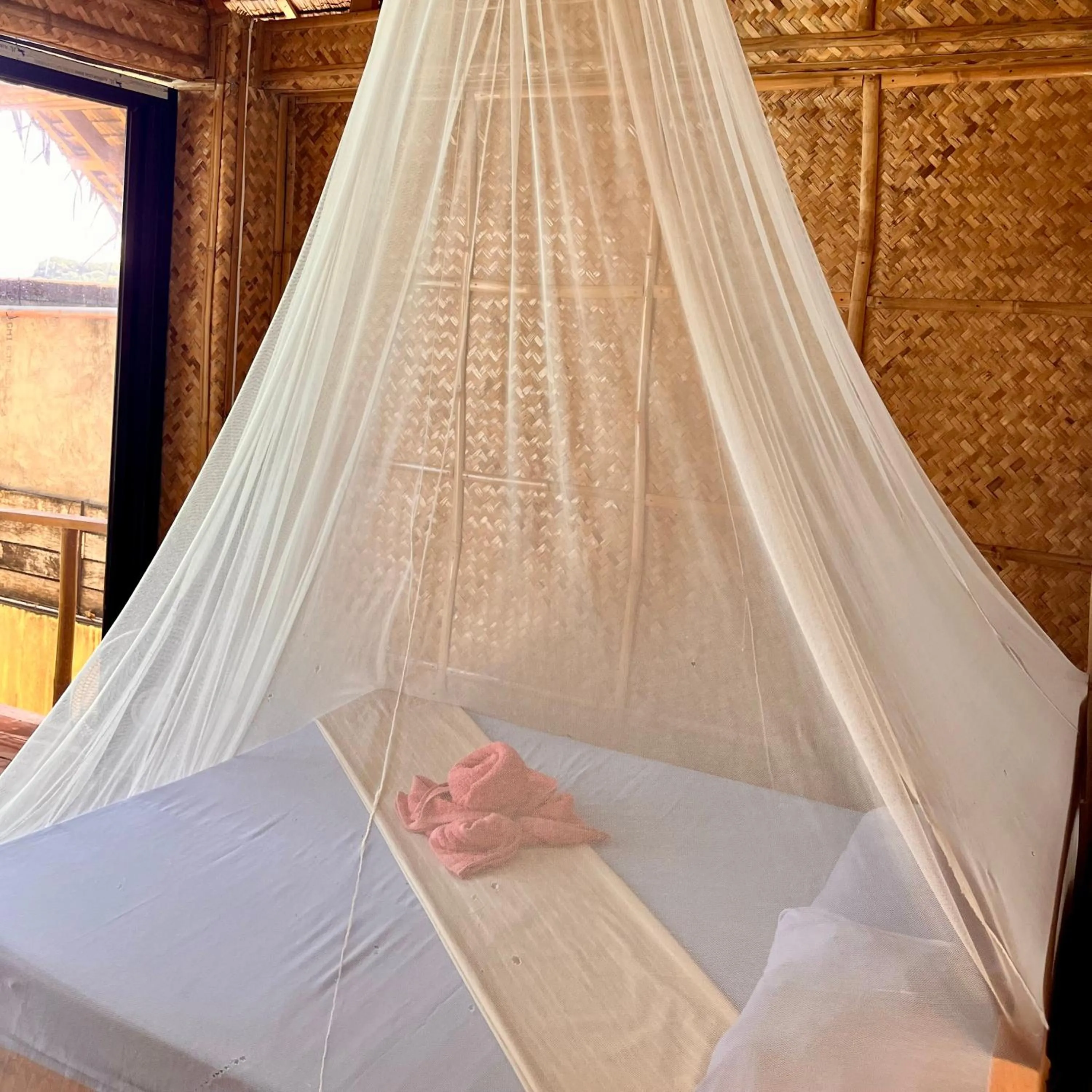 Bed in Amami Beachfront Villa with Private Beach