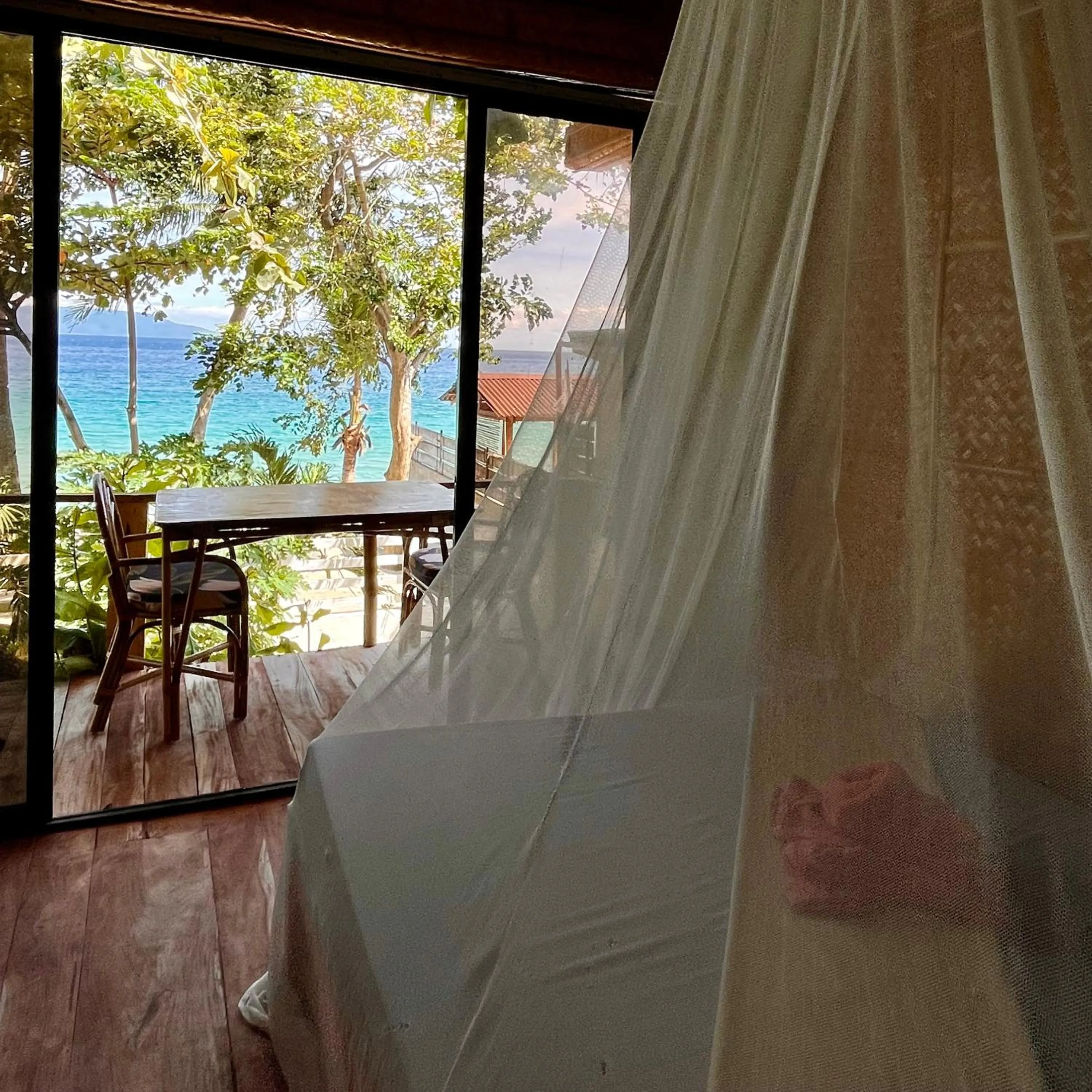 Bed in Amami Beachfront Villa with Private Beach