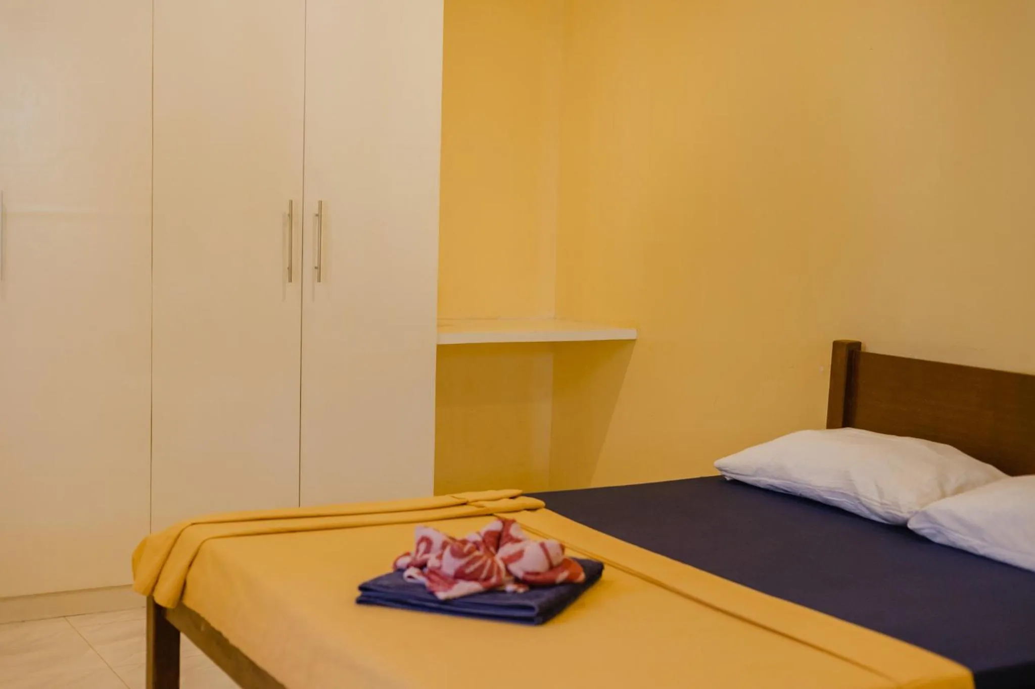 Bed in Amami Beachfront Villa with Private Beach