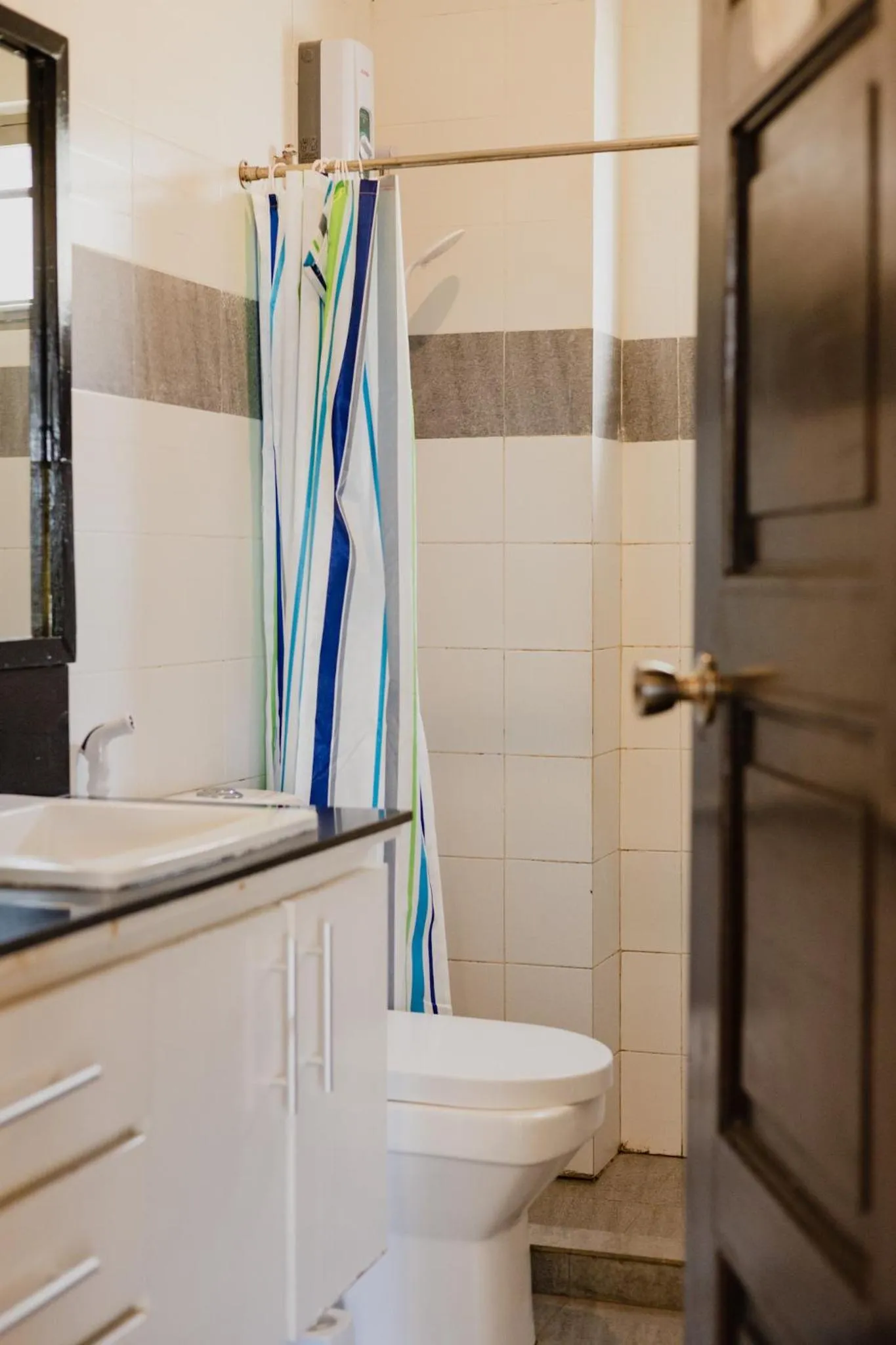 Shower in Amami Beachfront Villa with Private Beach