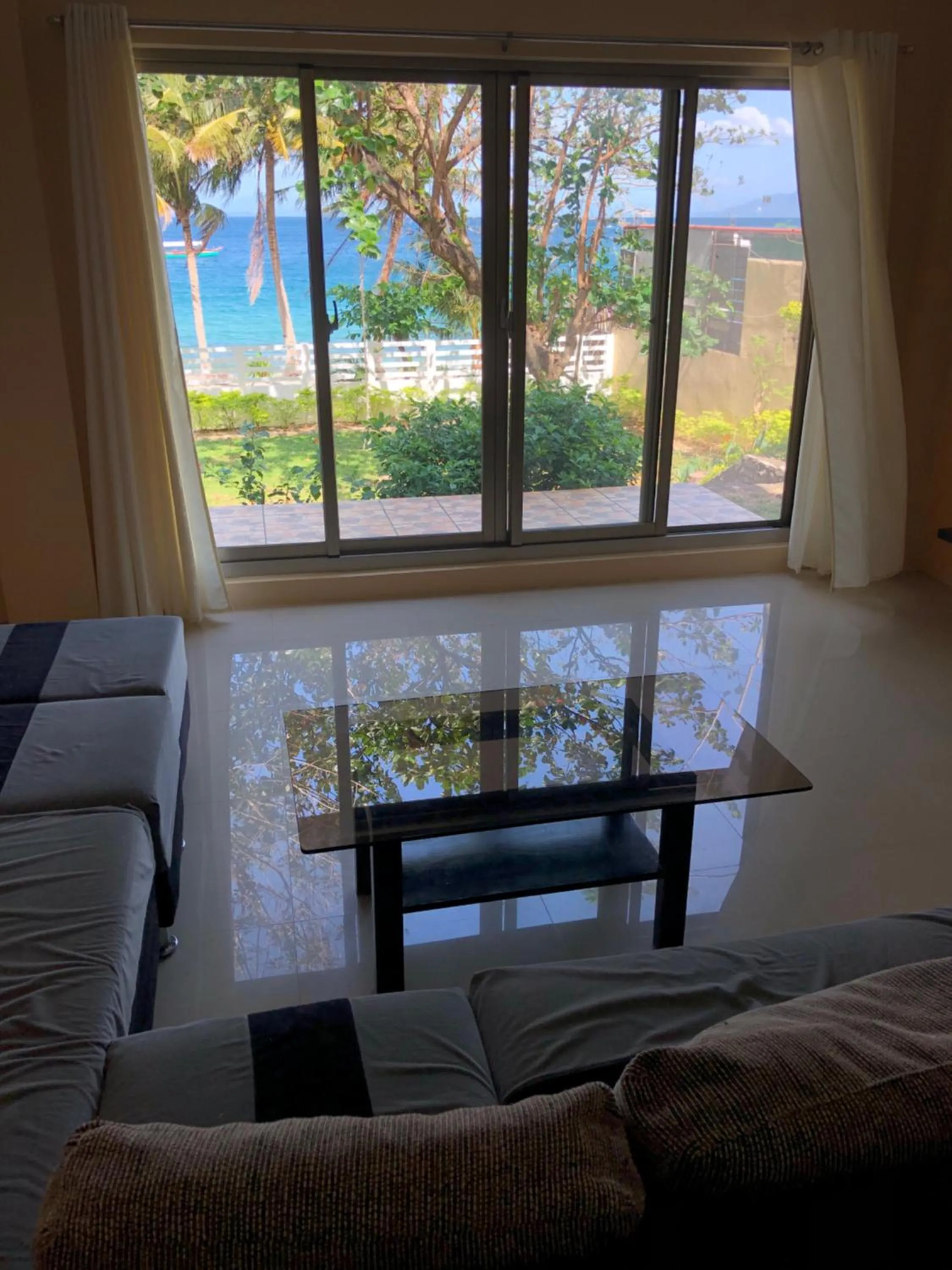 Living room in Amami Beachfront Villa with Private Beach