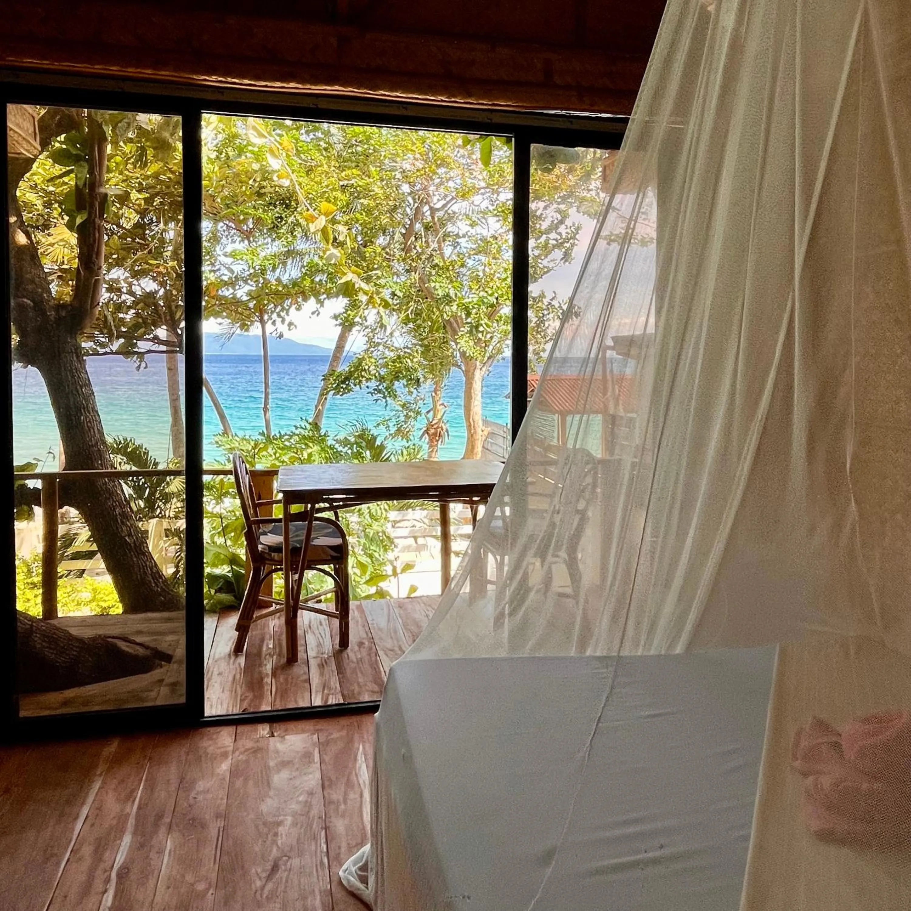 Bed in Amami Beachfront Villa with Private Beach