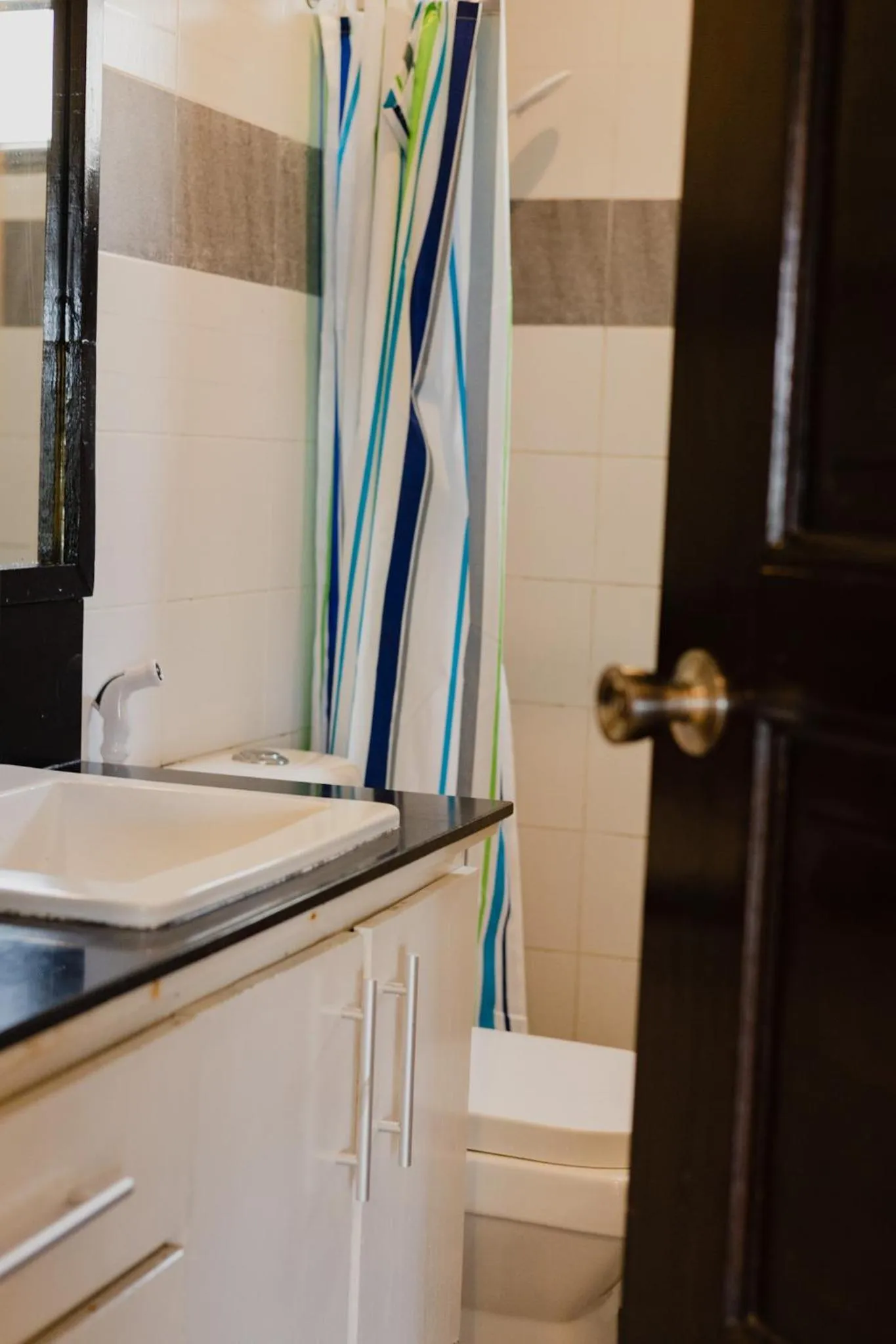 Shower in Amami Beachfront Villa with Private Beach