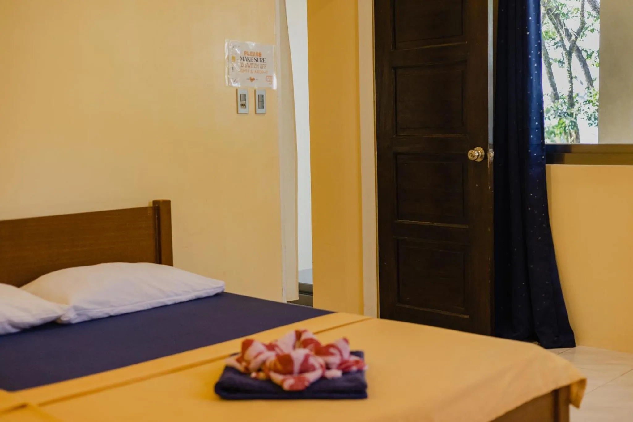 Bed in Amami Beachfront Villa with Private Beach