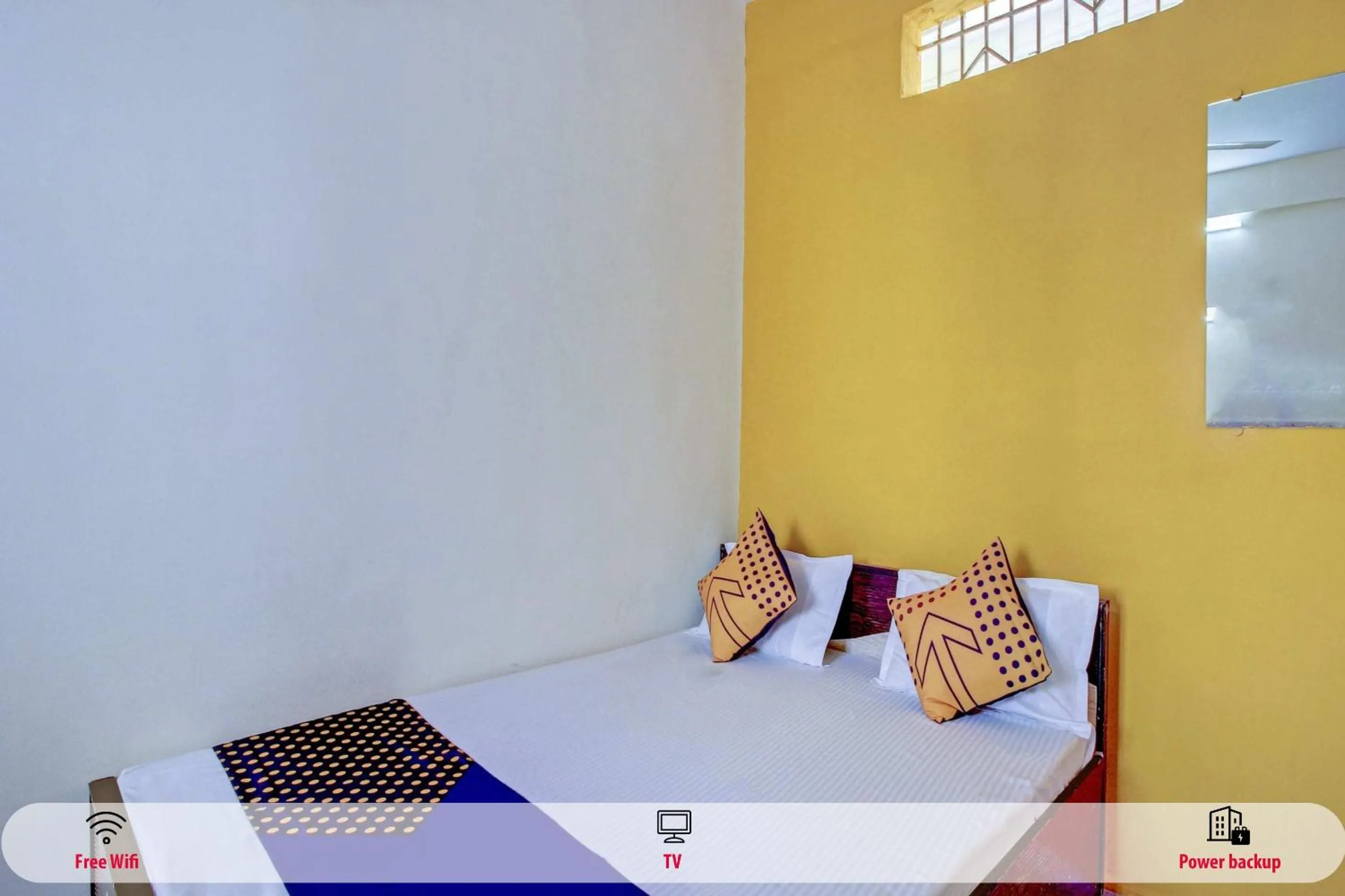 Bedroom in SPOT ON 63695 Hotel Sai Muskaan