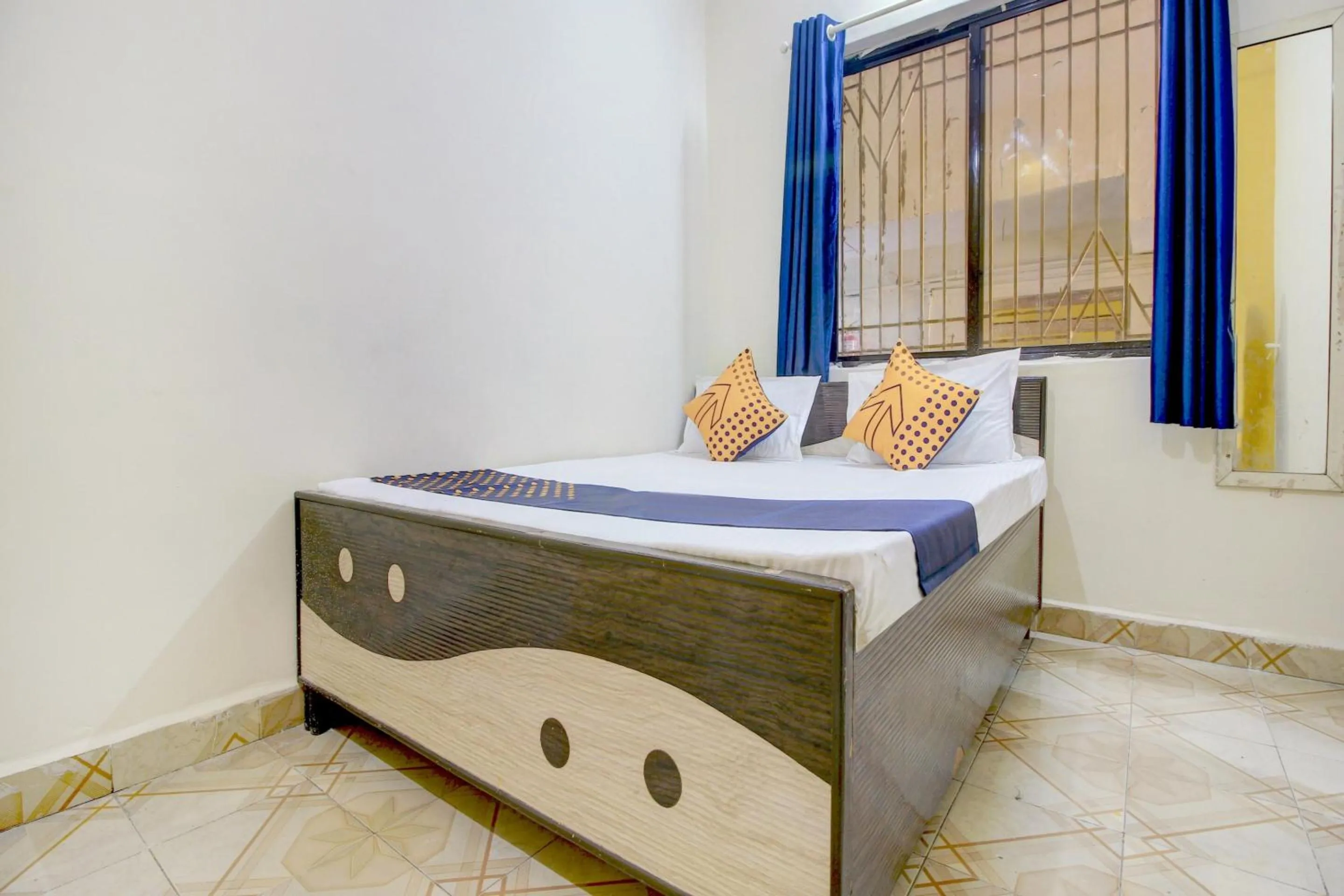 Bedroom in SPOT ON 63695 Hotel Sai Muskaan