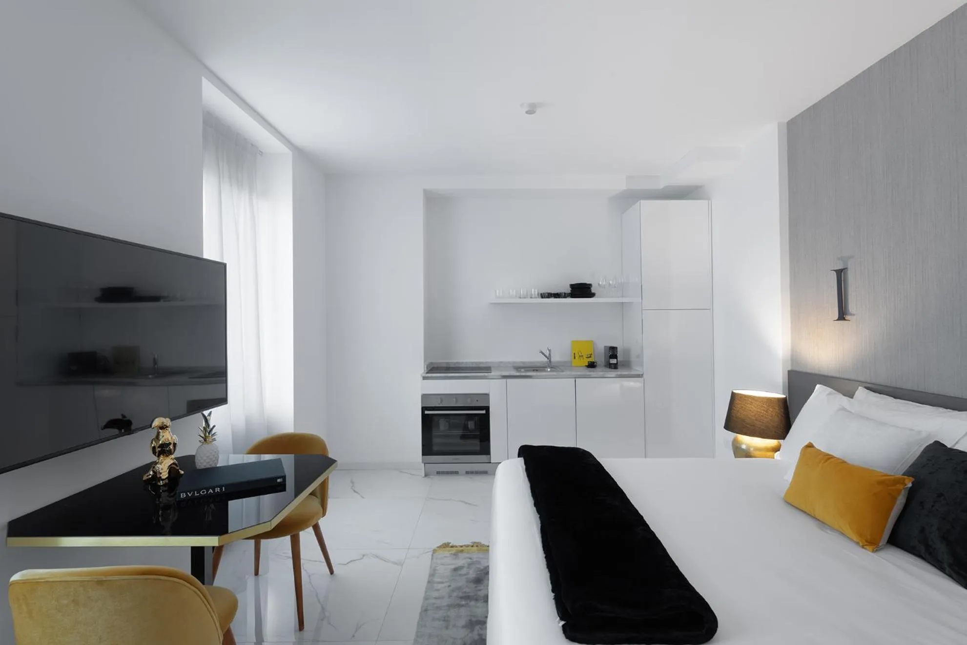 Bed in JOIVY Boutique Apartments Farneti