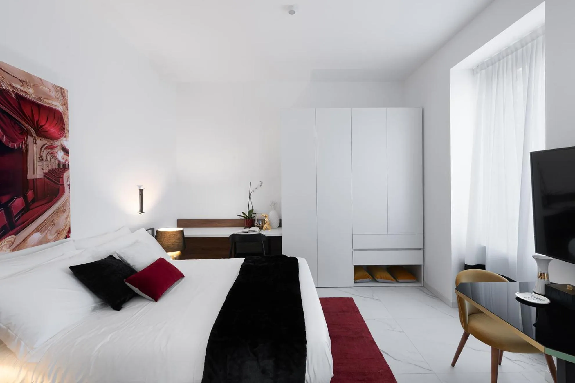 Living room, Bed in Aria Boutique Apartments Farneti