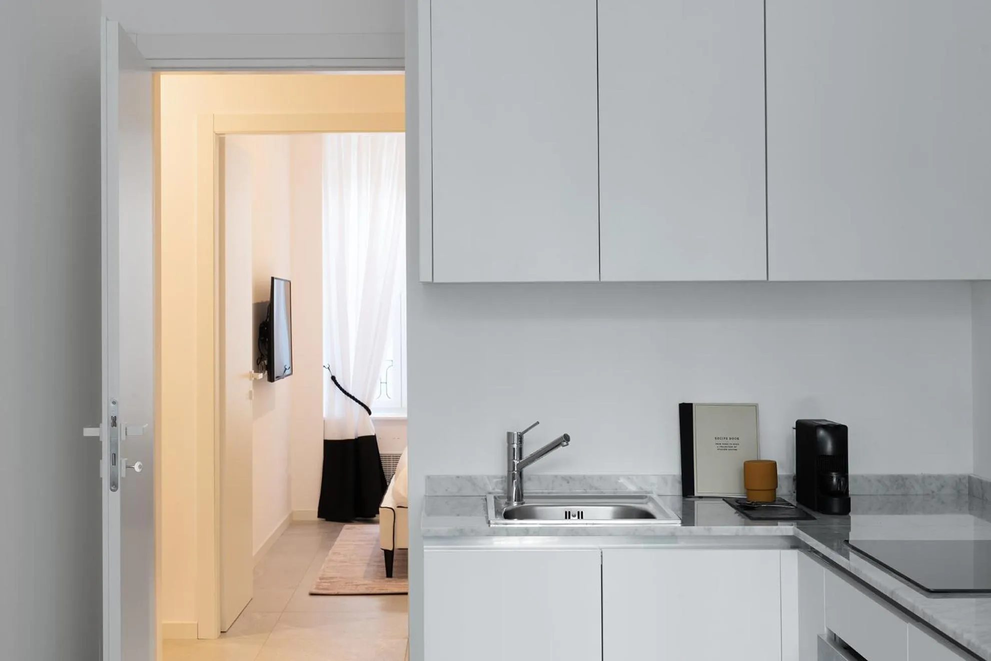 Kitchen or kitchenette in Aria Boutique Apartments Farneti