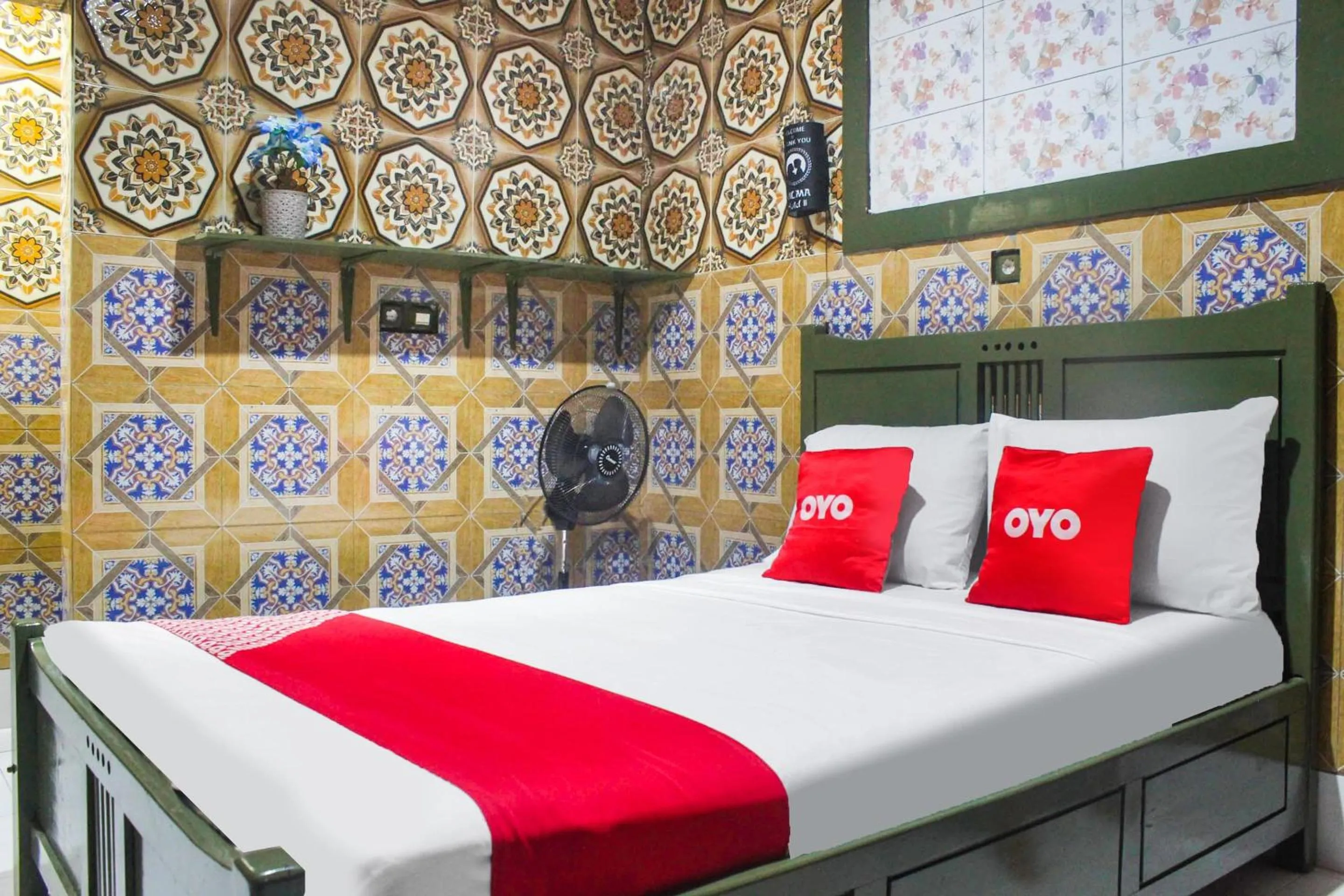 Bedroom in OYO 2518 Wilma Hotel Ii Premier