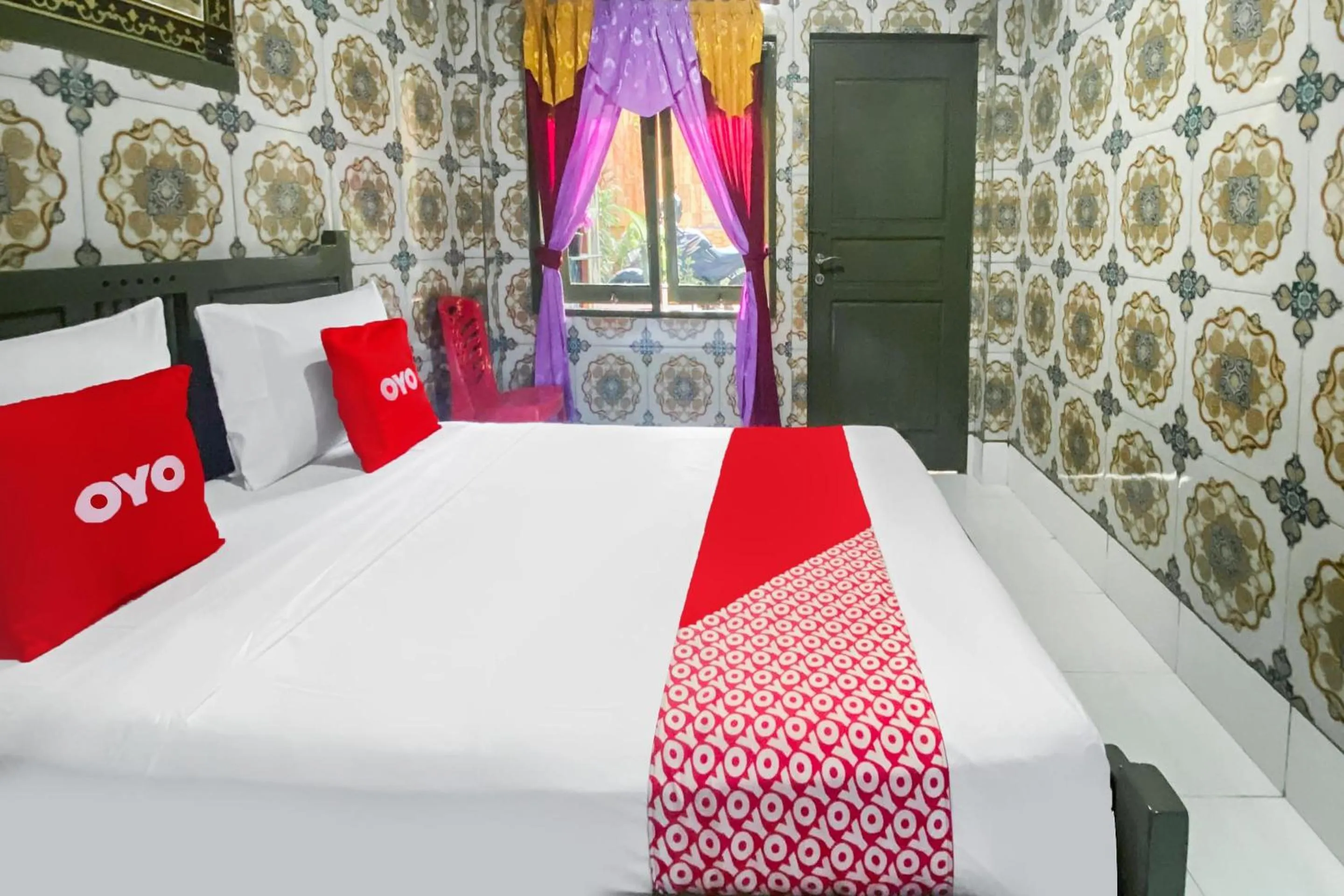 Bedroom in OYO 2518 Wilma Hotel Ii Premier