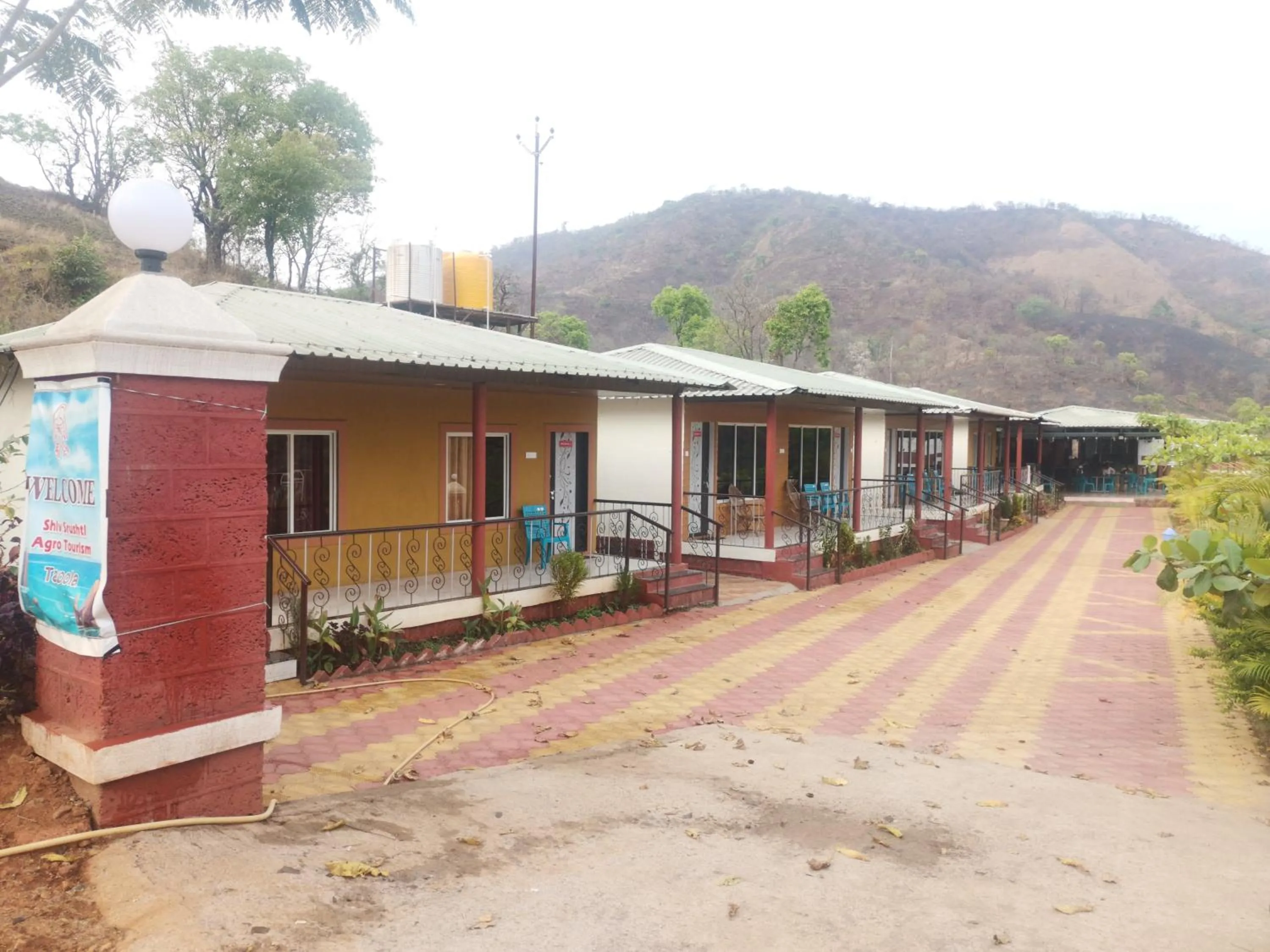 Facade/entrance in Shivshrushti Agro Tourism & River Camp Tapola