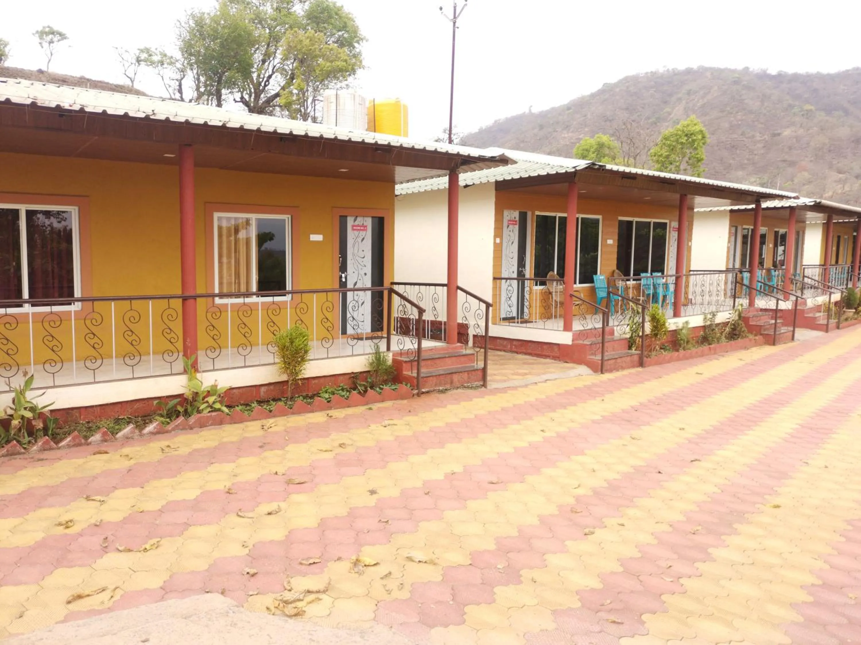 Bedroom in Shivshrushti Agro Tourism & River Camp Tapola