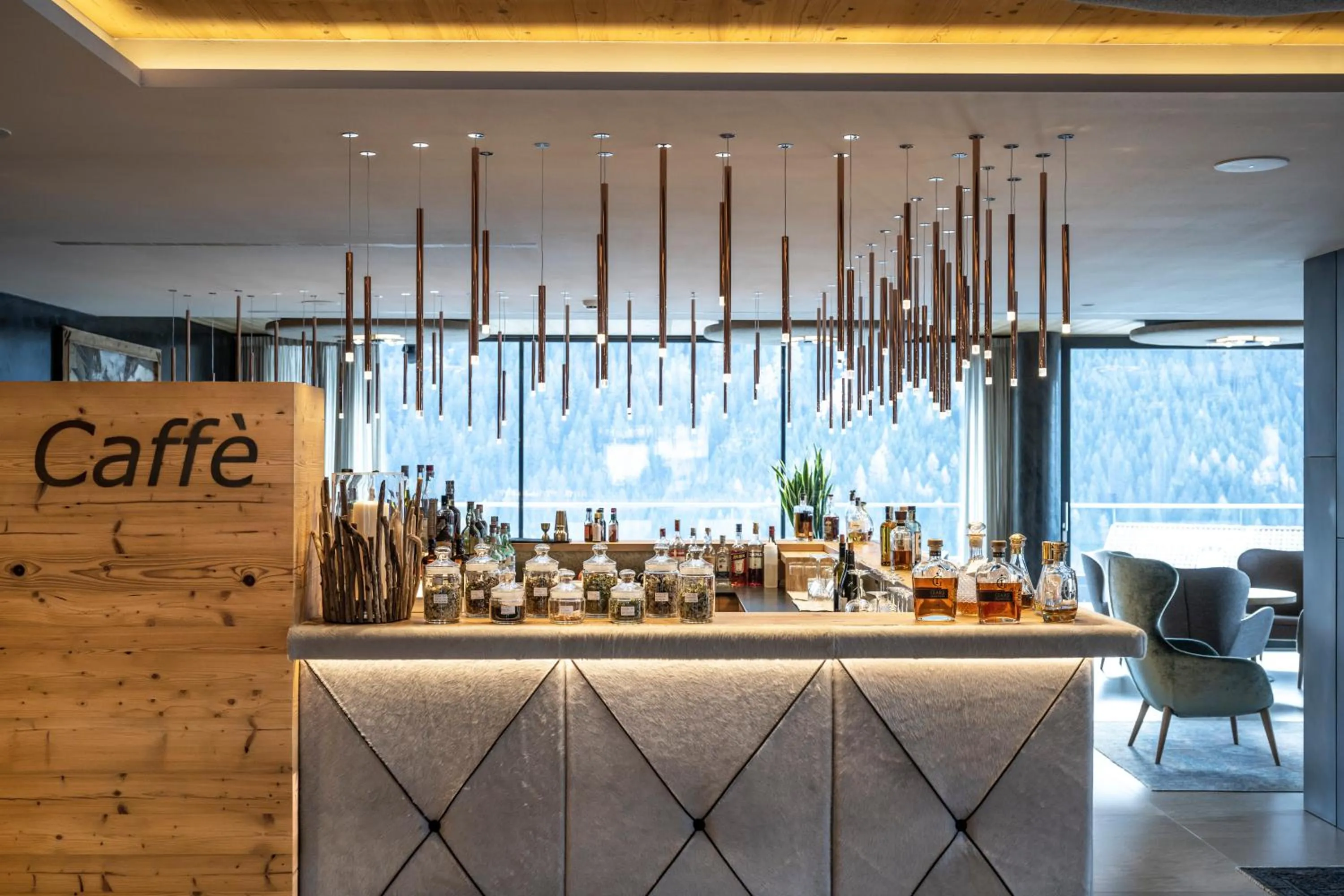 Lounge or bar in Ciampedie Luxury Alpine Spa Hotel