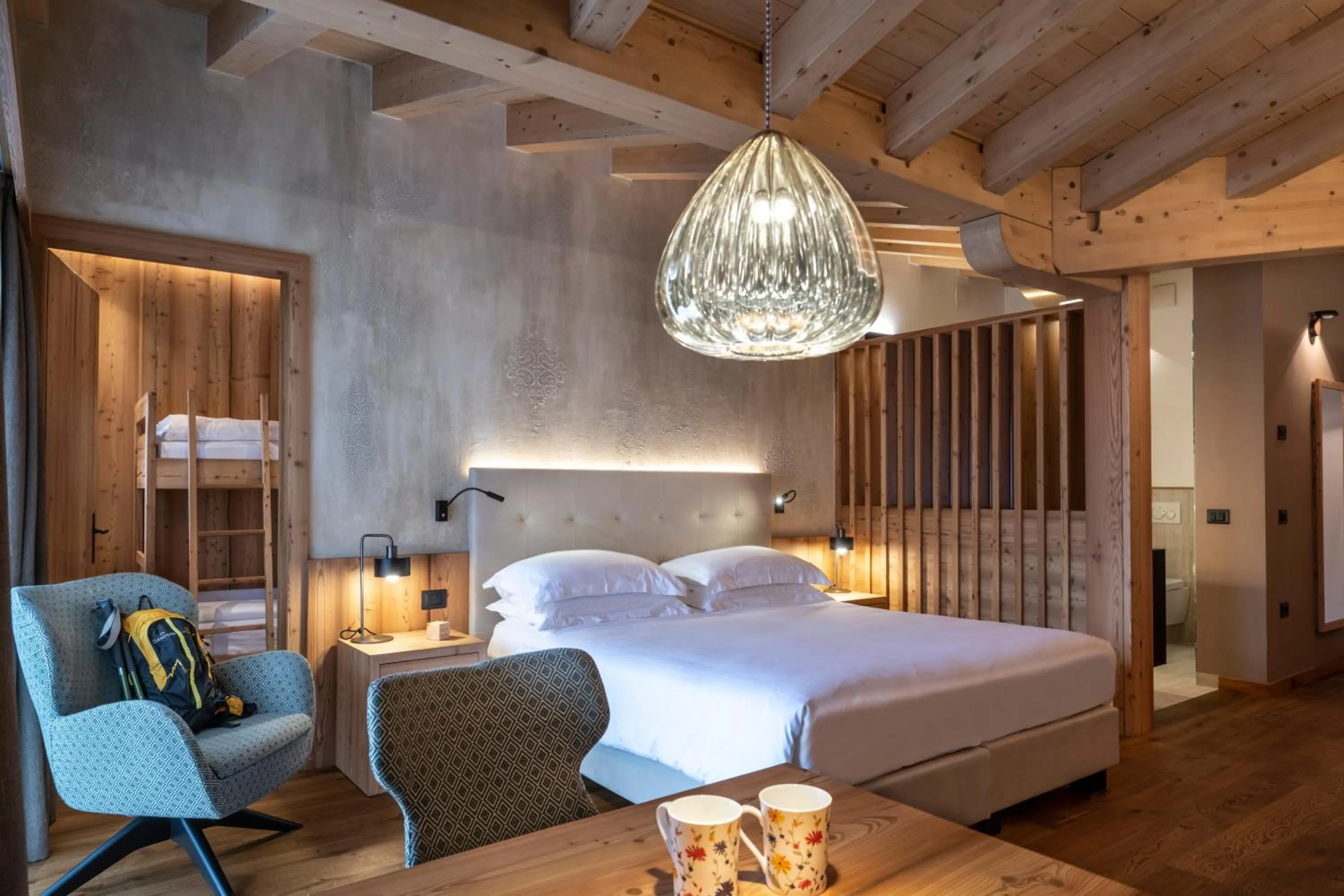 Bed in Ciampedie Luxury Alpine Spa Hotel