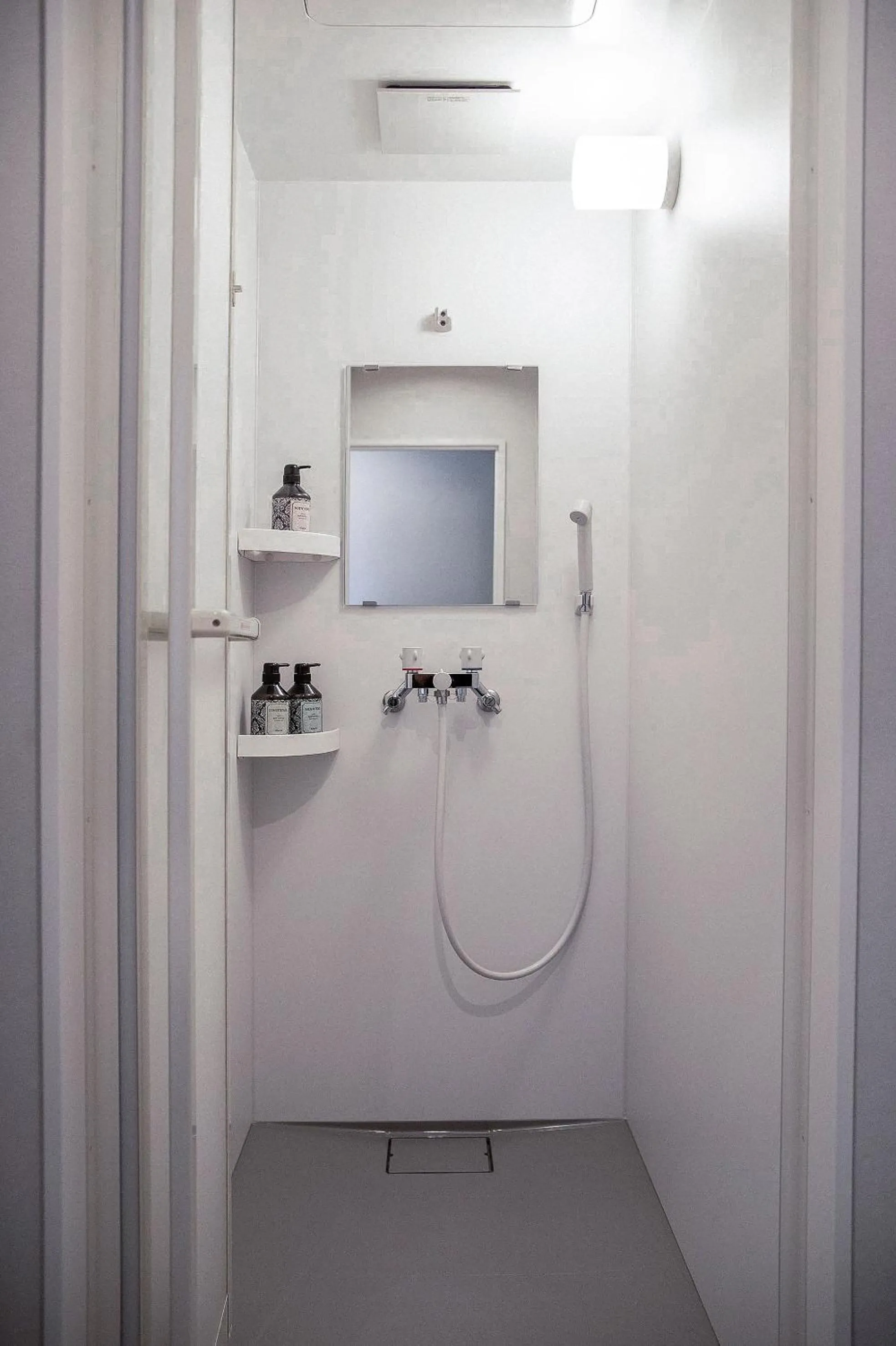 Shower in The Apartment Hotels KOU