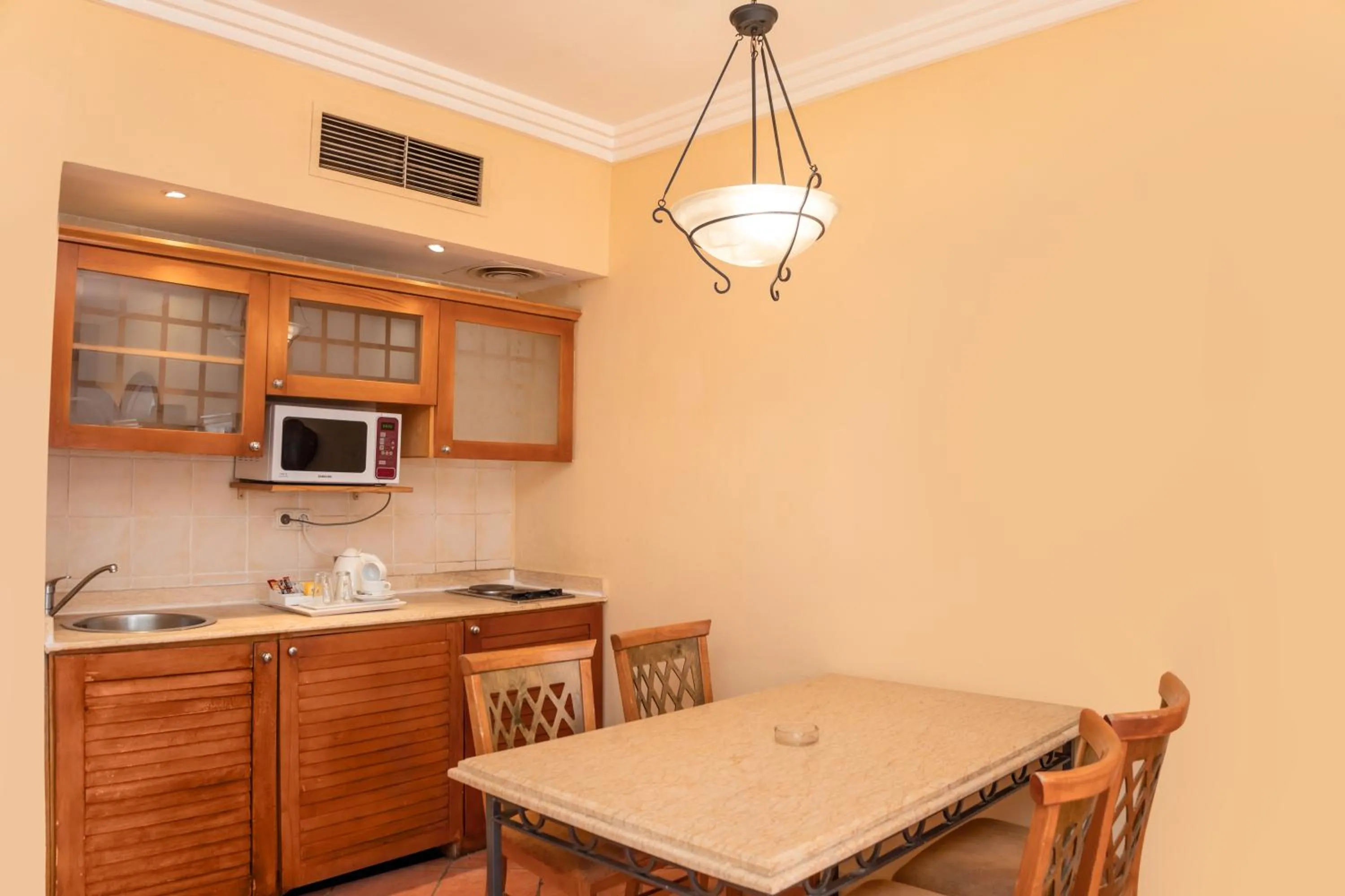 Kitchen or kitchenette in Sharm Dreams Vacation Club - Aqua Park