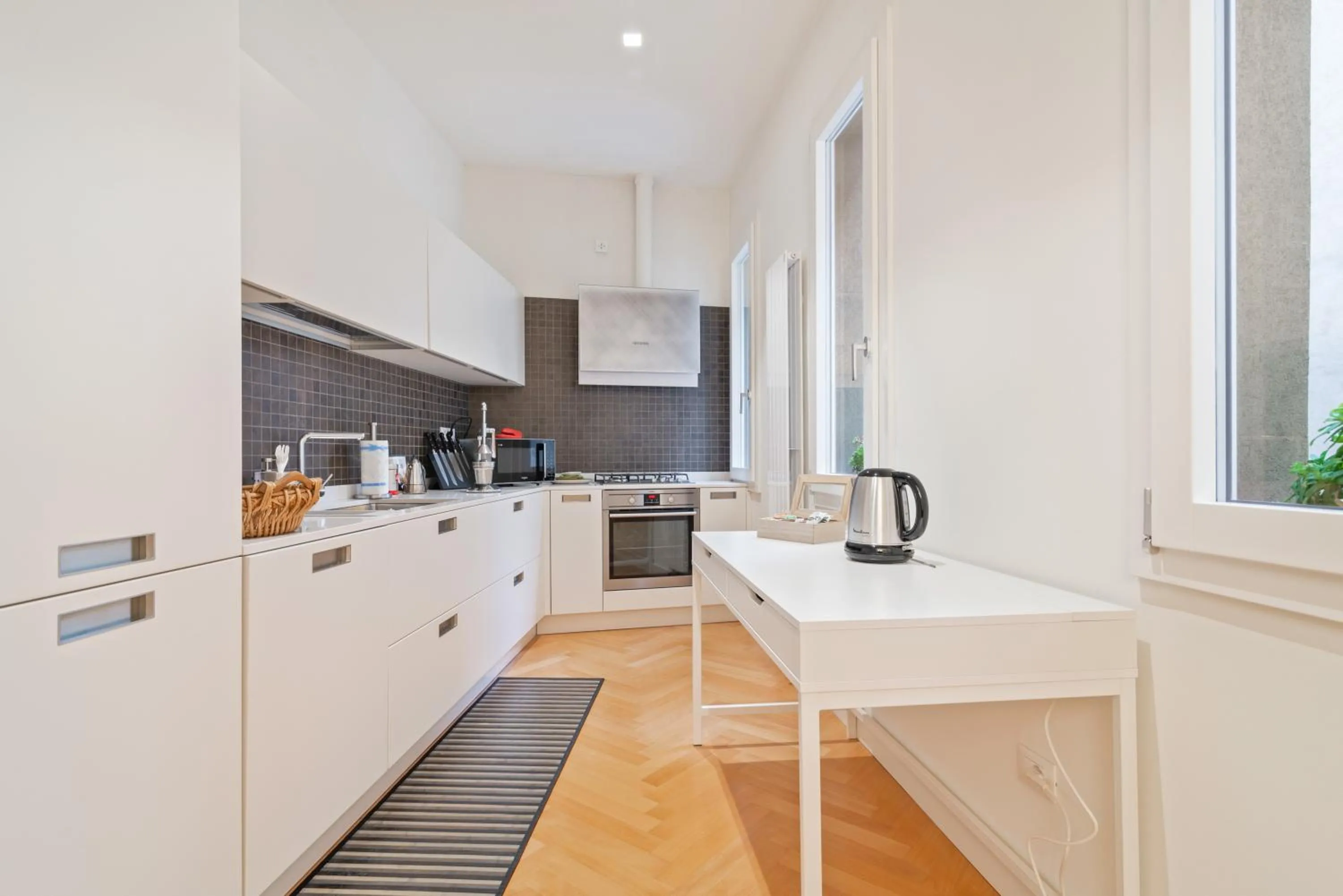 Kitchen or kitchenette in GuestHost - San Fermo Luxury Apartment
