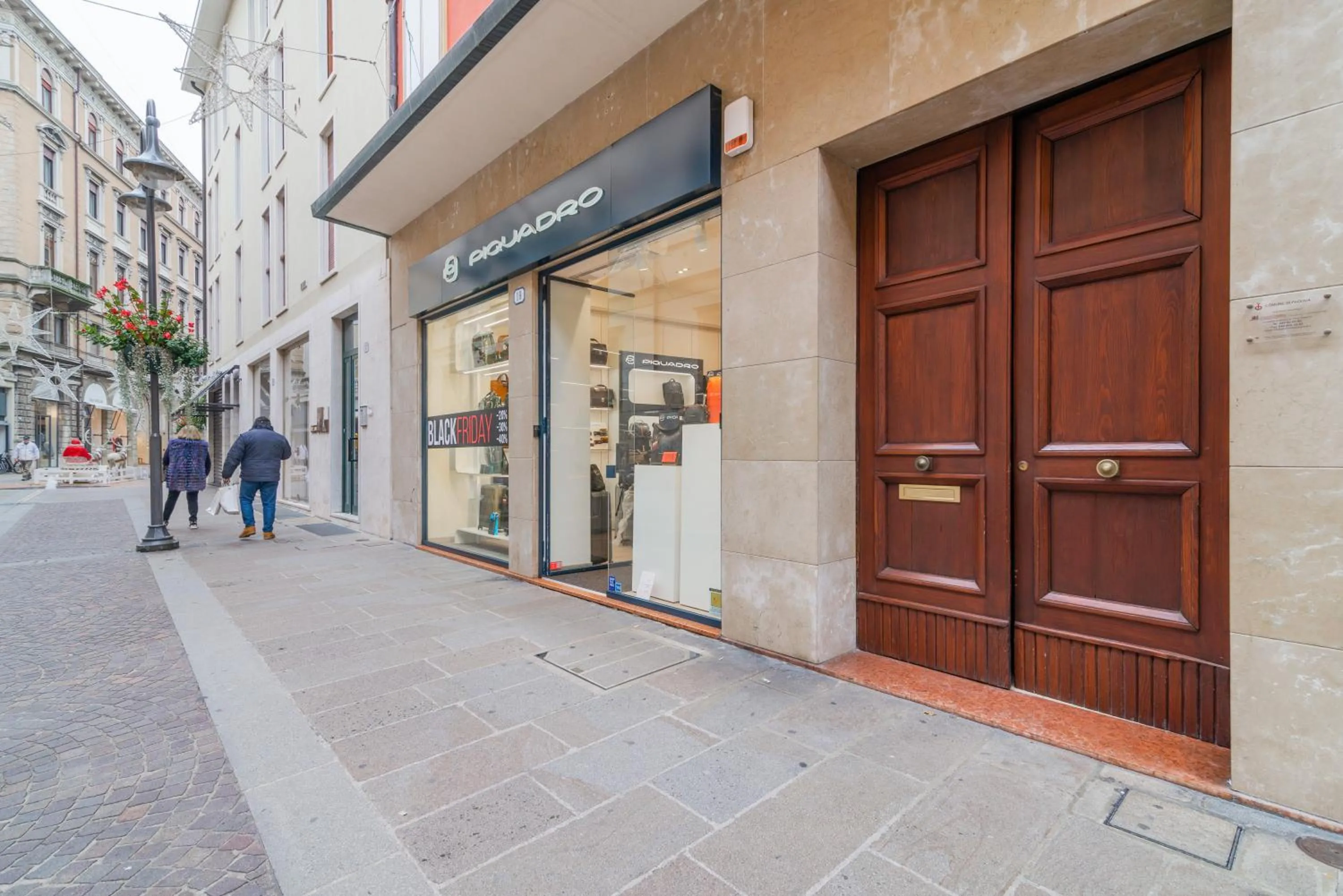 Facade/entrance in GuestHost - San Fermo Luxury Apartment