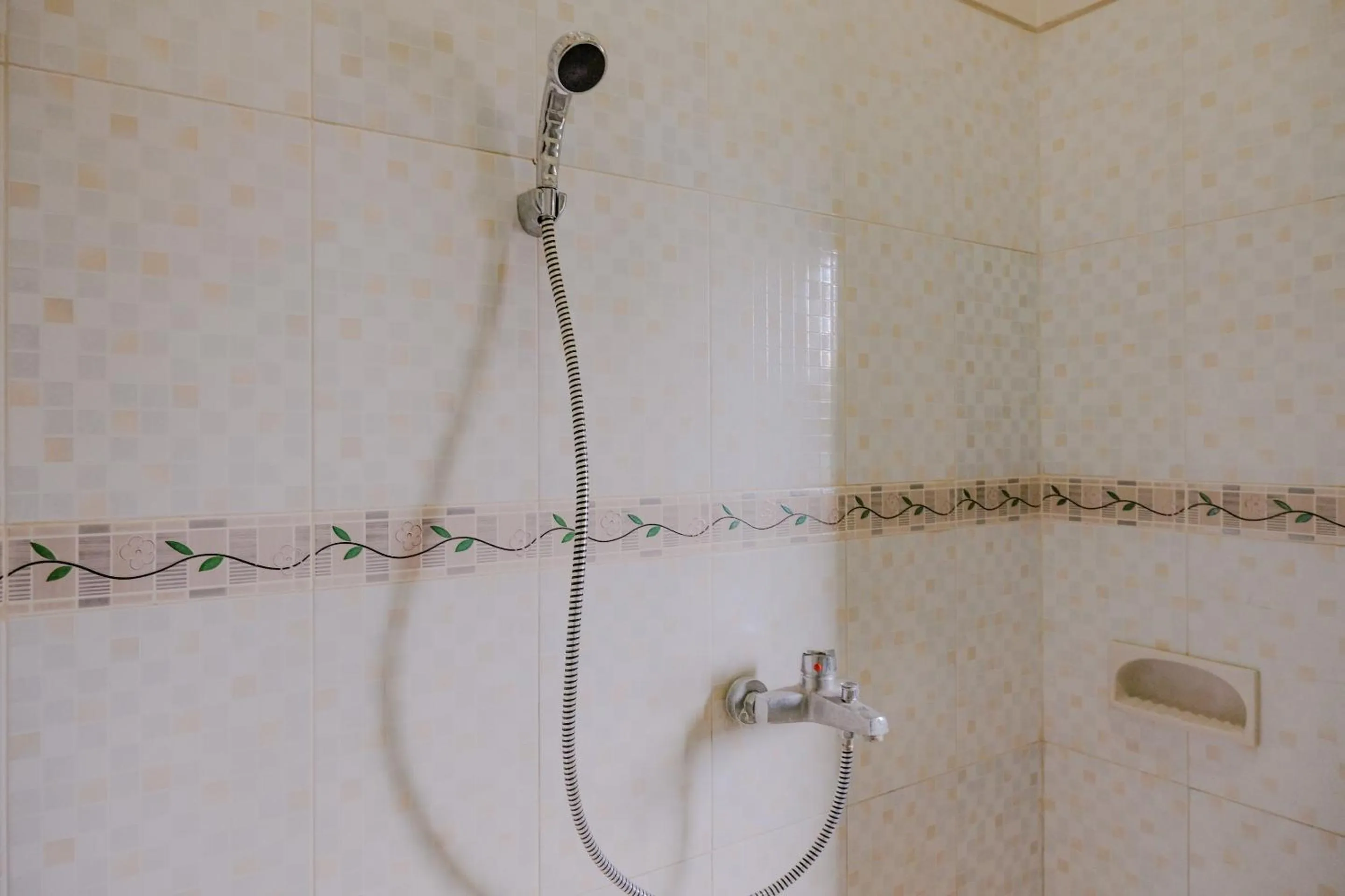 Bathroom in OYO 2376 Tiara Family Residence