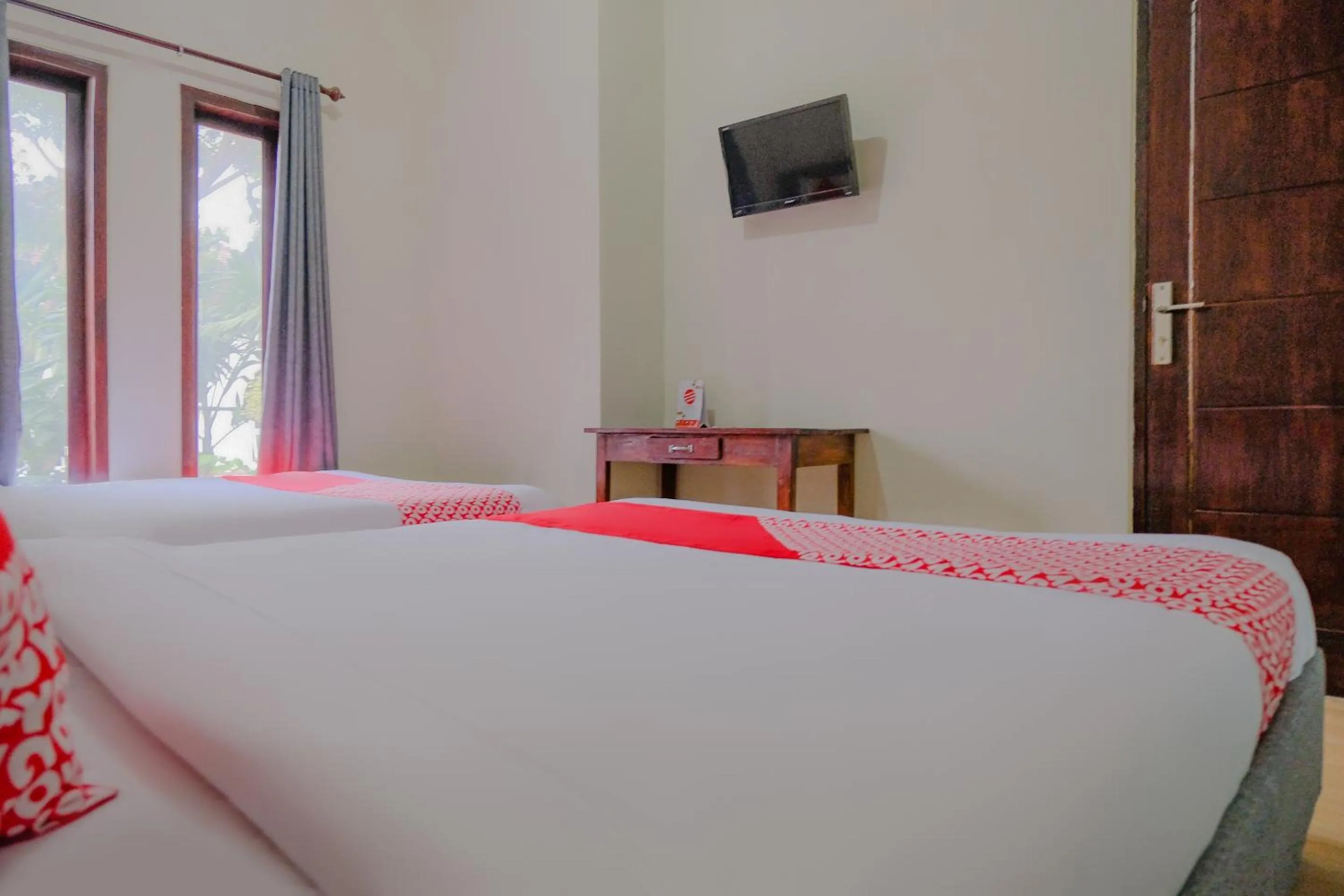 Bedroom in OYO 2376 Tiara Family Residence