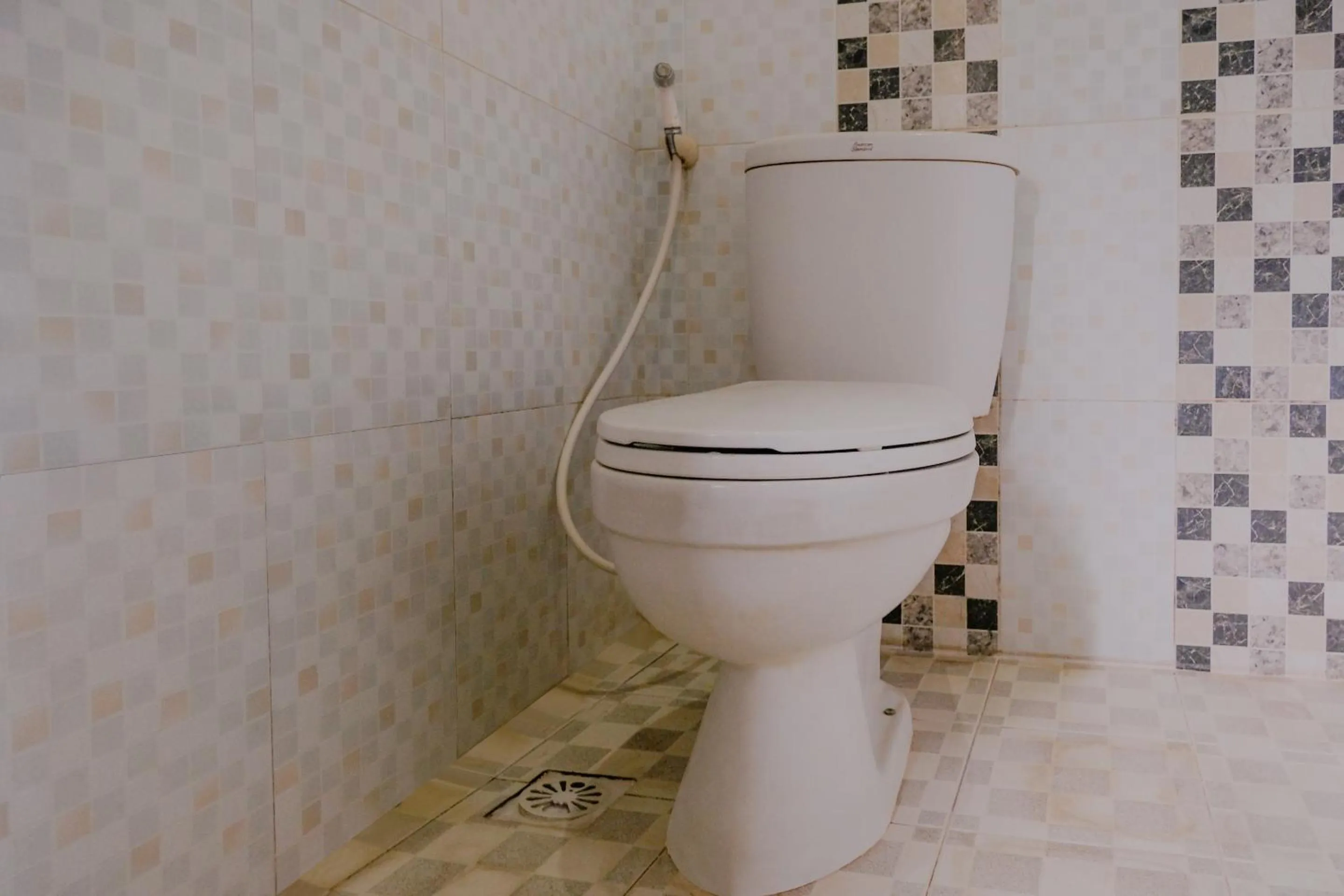 Bathroom in OYO 2376 Tiara Family Residence