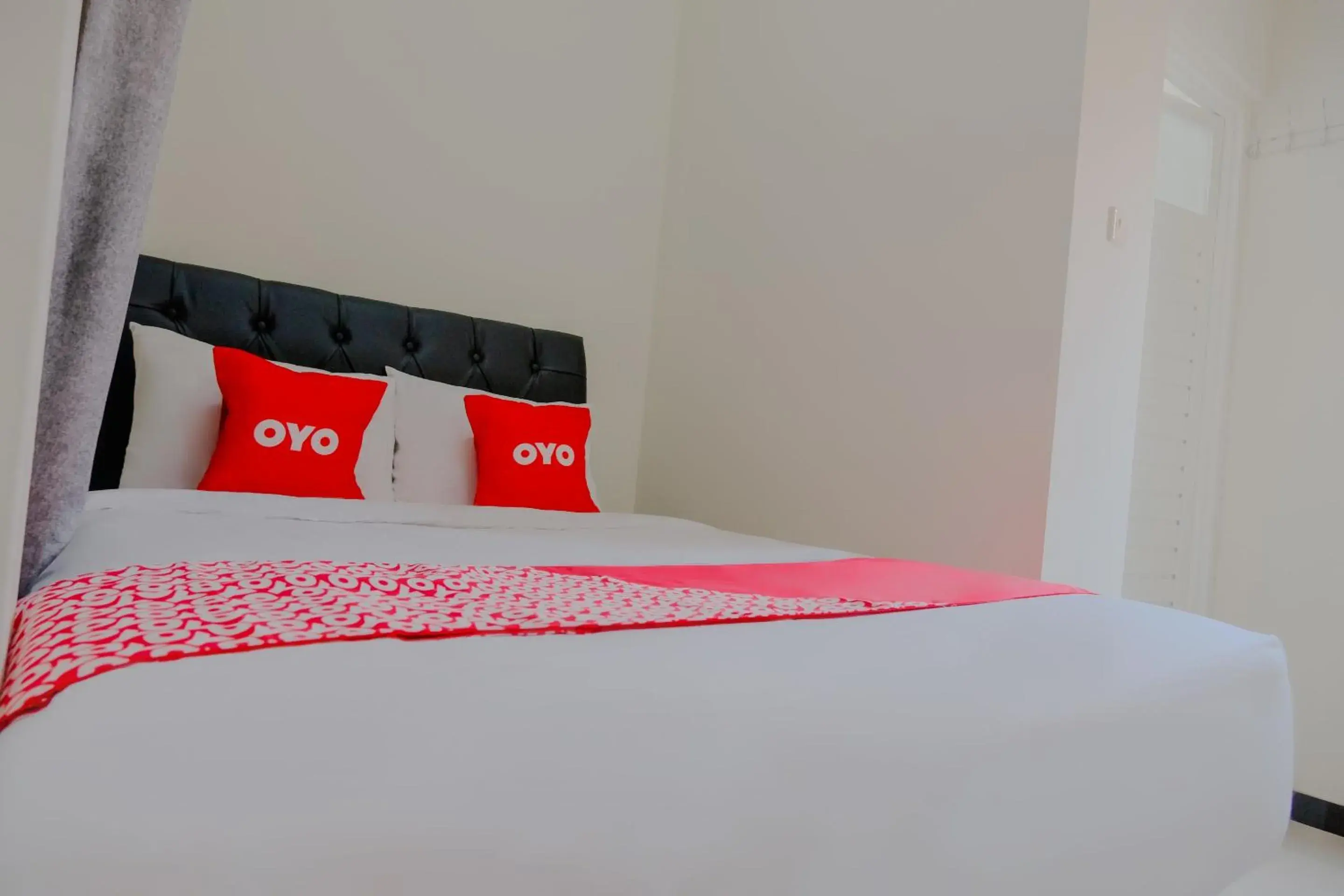 Bedroom in OYO 2376 Tiara Family Residence Bedroom in OYO 2376 Tiara Family Residence