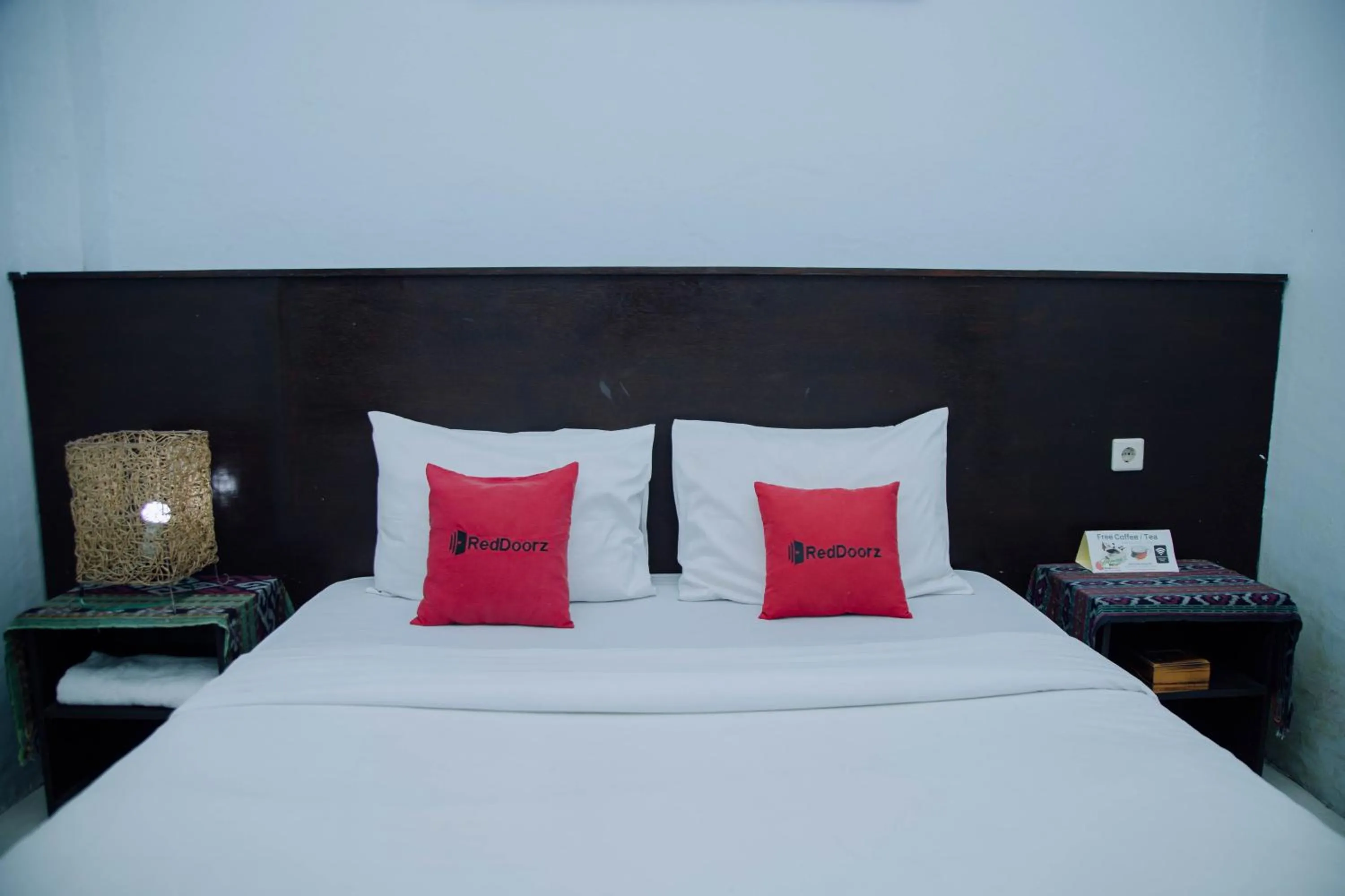 Bedroom, Bed in RedDoorz at Hening Homestay