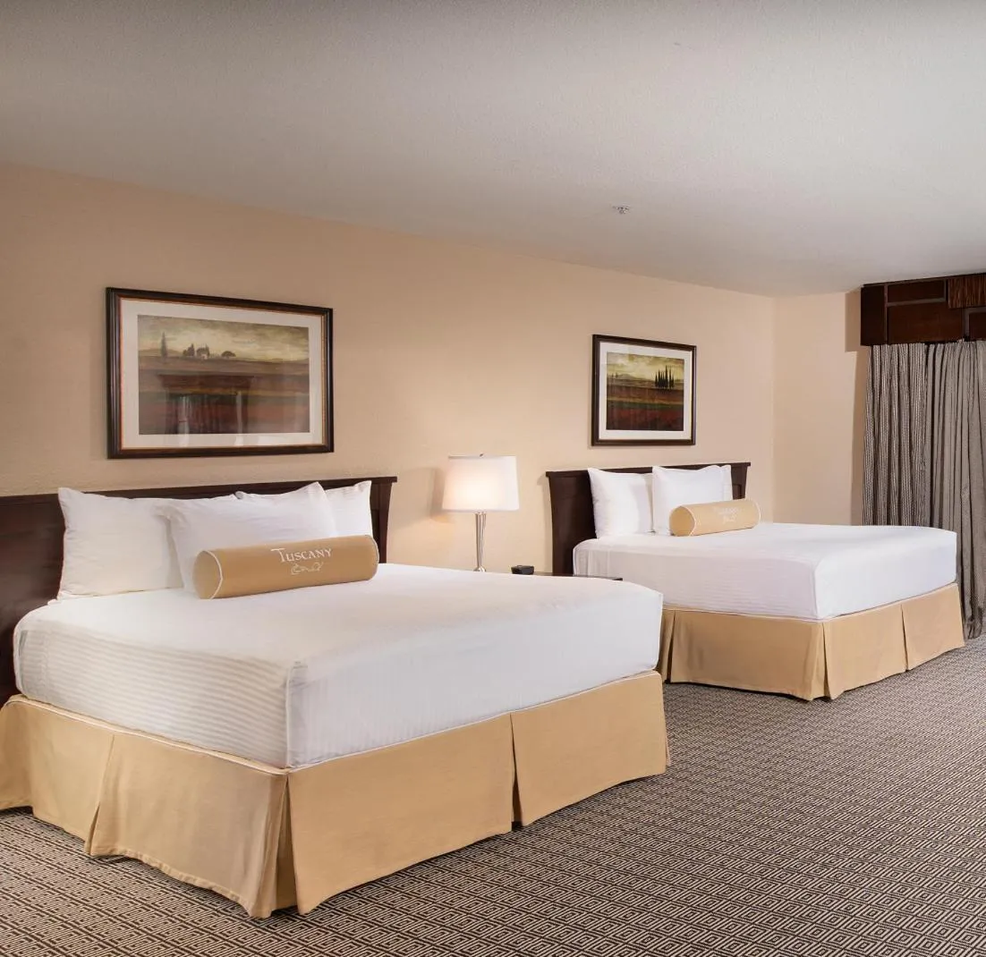 Bed in Tuscany Suites & Casino