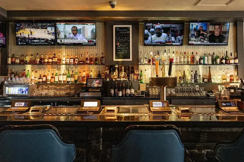 Lounge or bar in Tuscany Suites & Casino Lounge or bar in Tuscany Suites & Casino