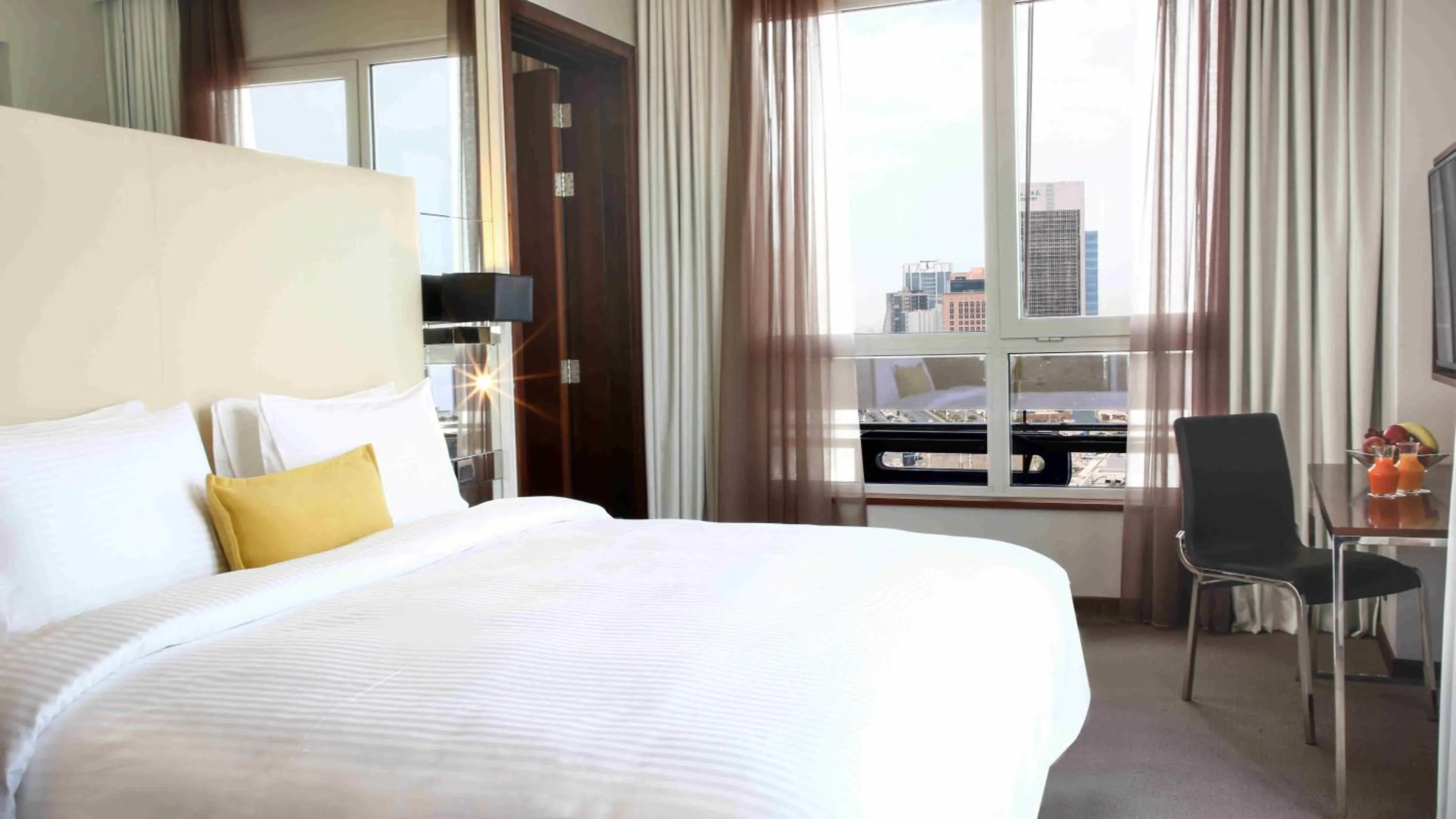 Bed in Centro Corniche Al Khobar by Rotana