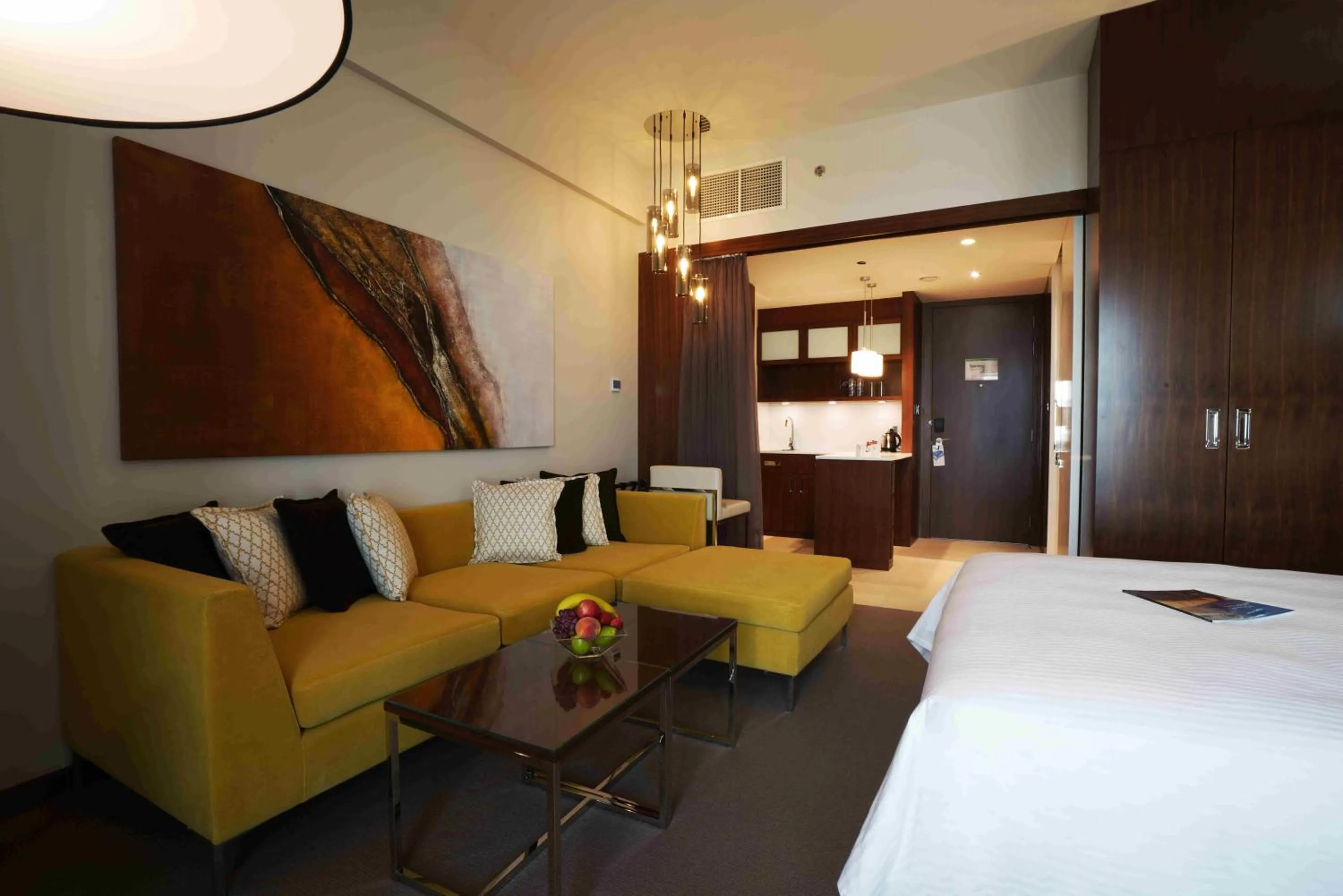 Seating area, Bed in Centro Corniche Al Khobar by Rotana