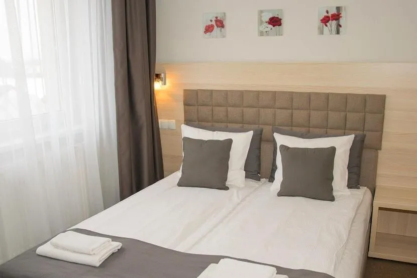 Bed in Old Tree Villa & Restaurant