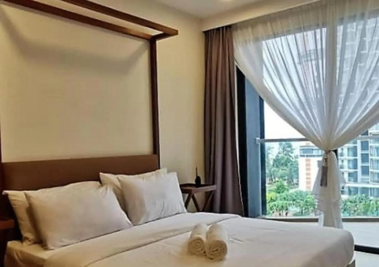 Bed in Timurbay Seafront Residence & Suites