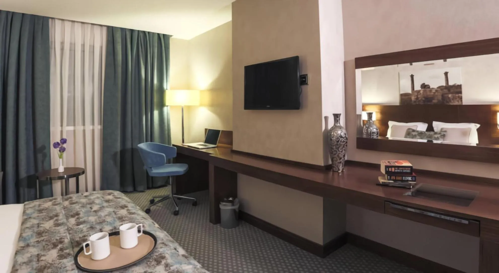 Bed in Nevali Hotel & Convention Center