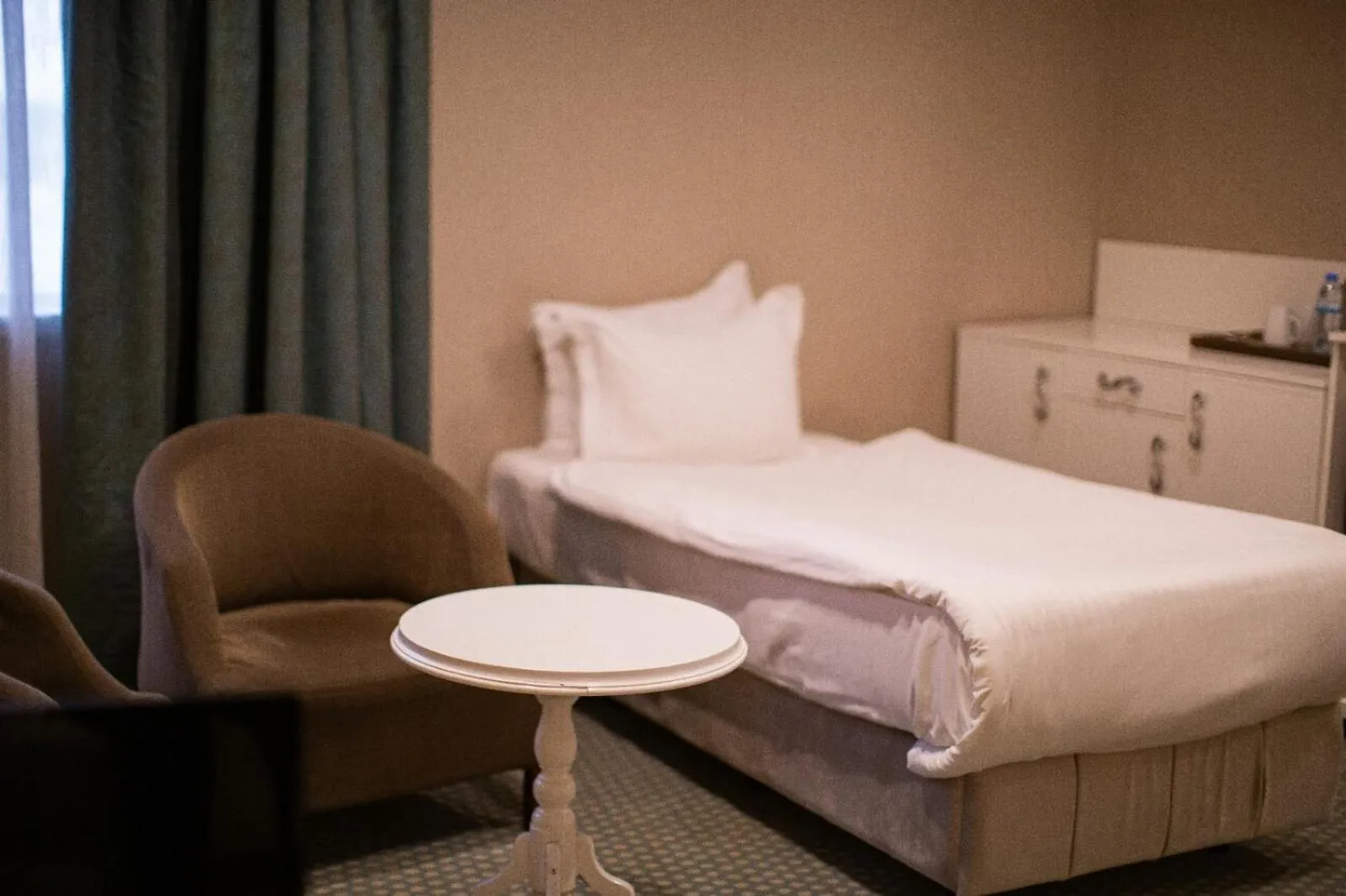 Bed in Nevali Hotel & Convention Center