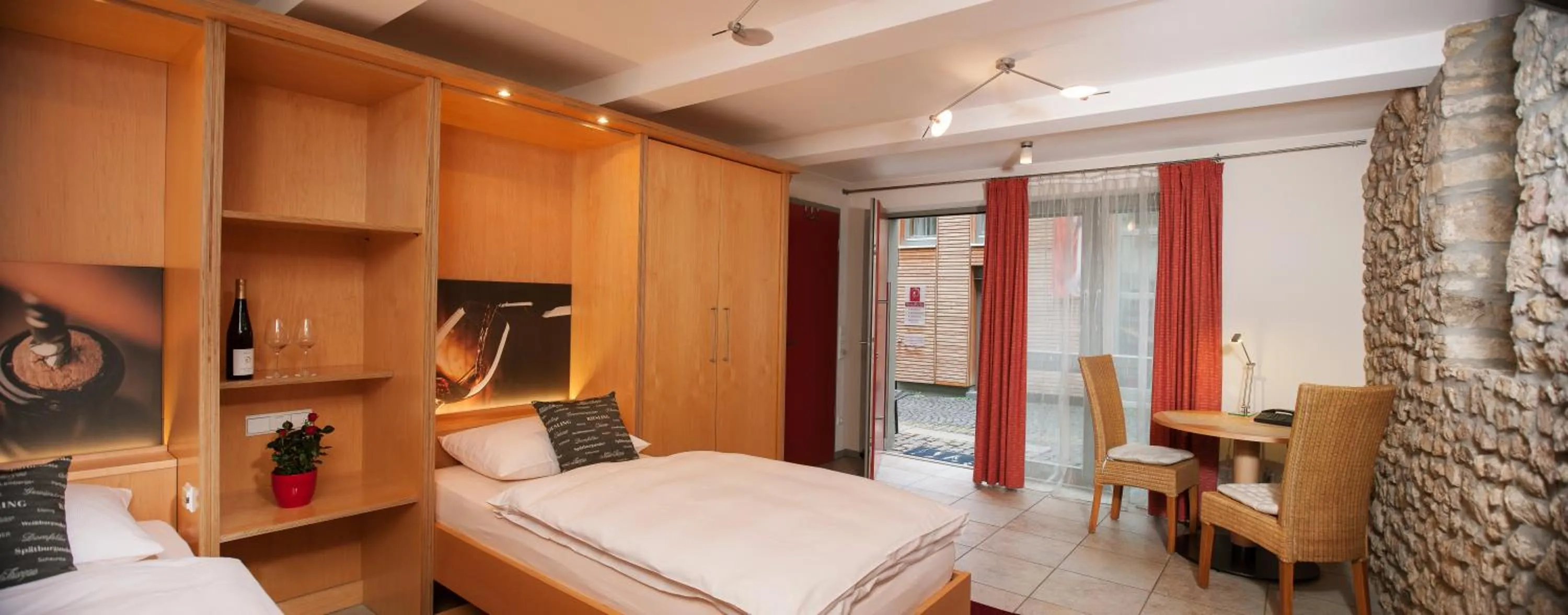 Photo of the whole room, Bed in Gästehaus & Weingut PETH