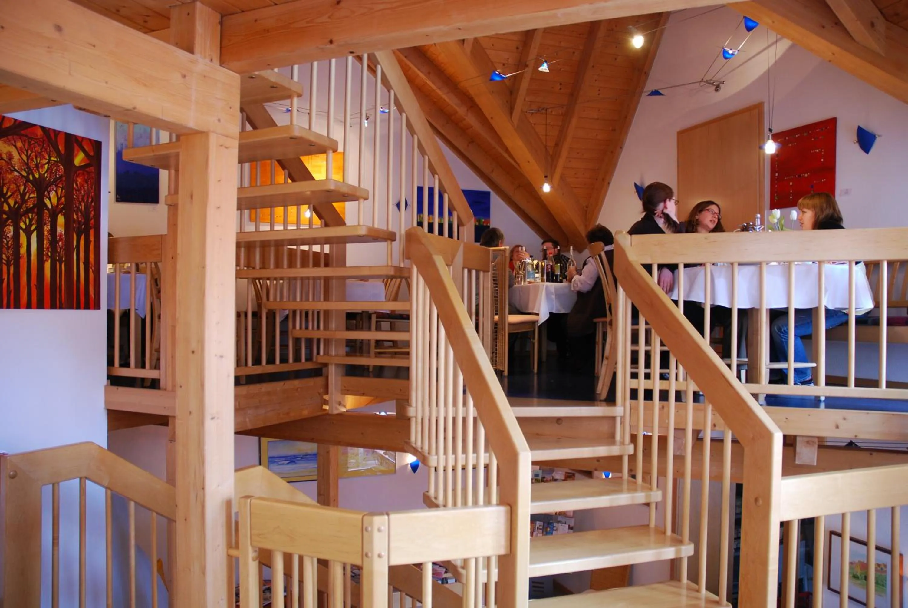 Communal lounge/ TV room in Gästehaus & Weingut PETH