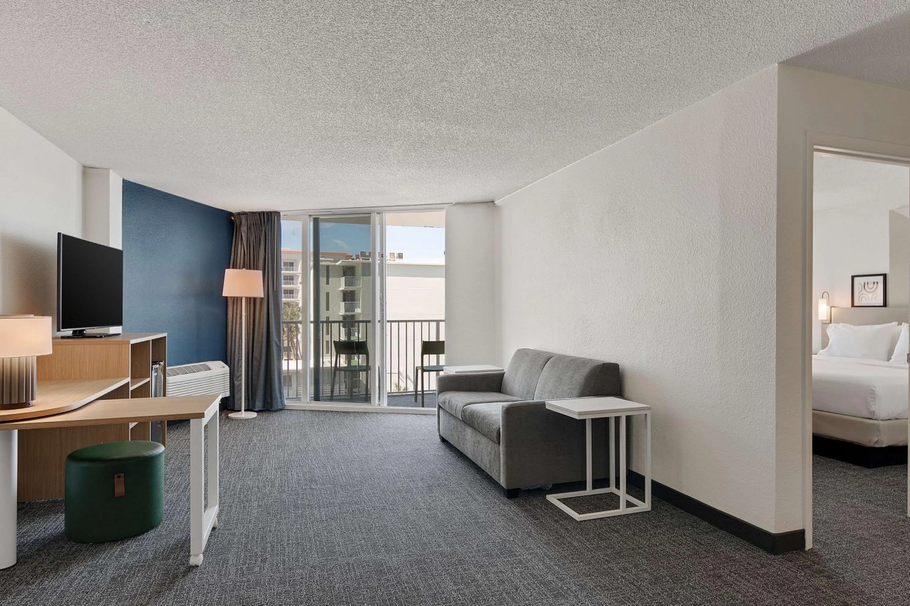 Living room, Bed in Spark by Hilton Ormond Beach Oceanfront