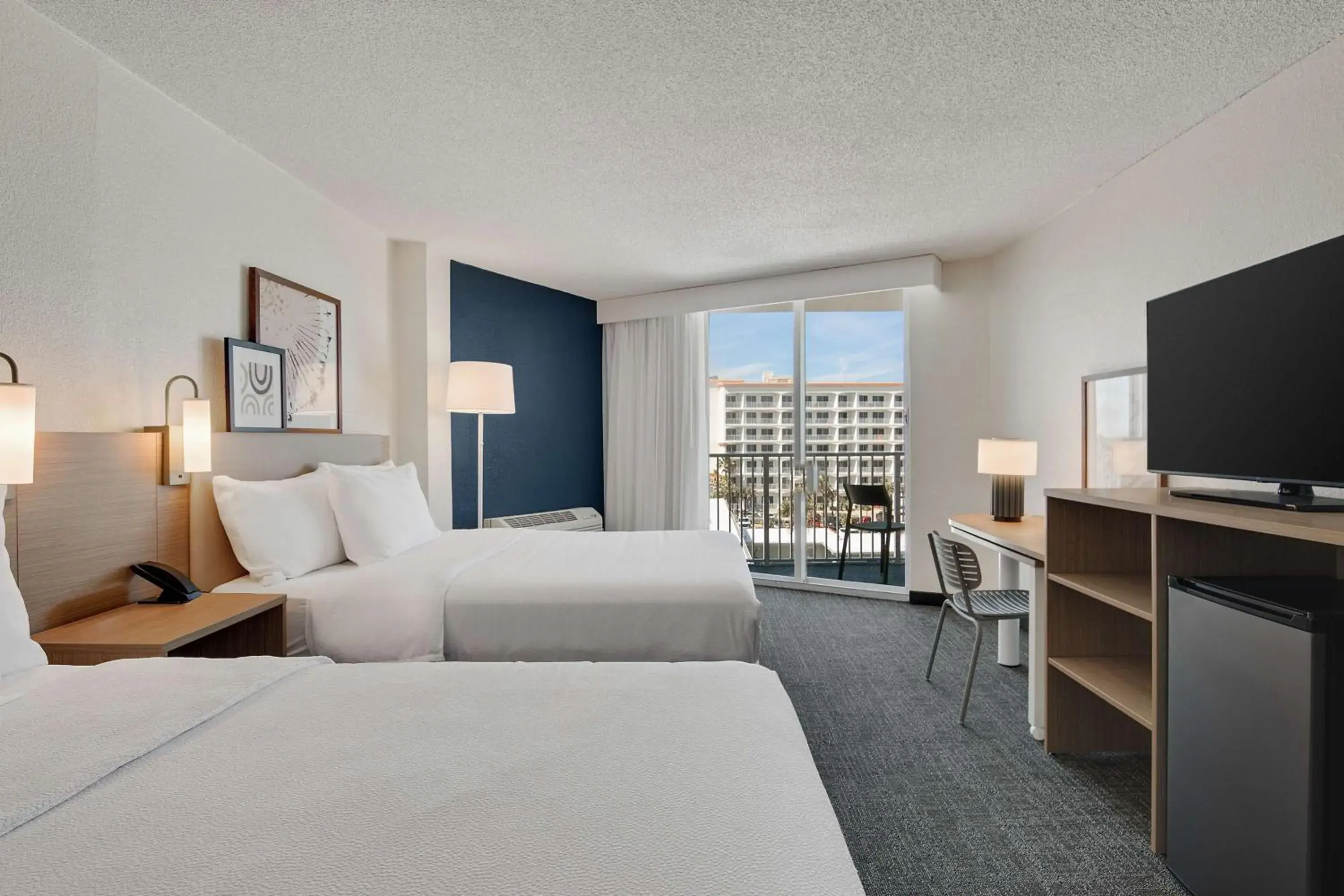 Bed in Spark by Hilton Ormond Beach Oceanfront Bed in Spark by Hilton Ormond Beach Oceanfront
