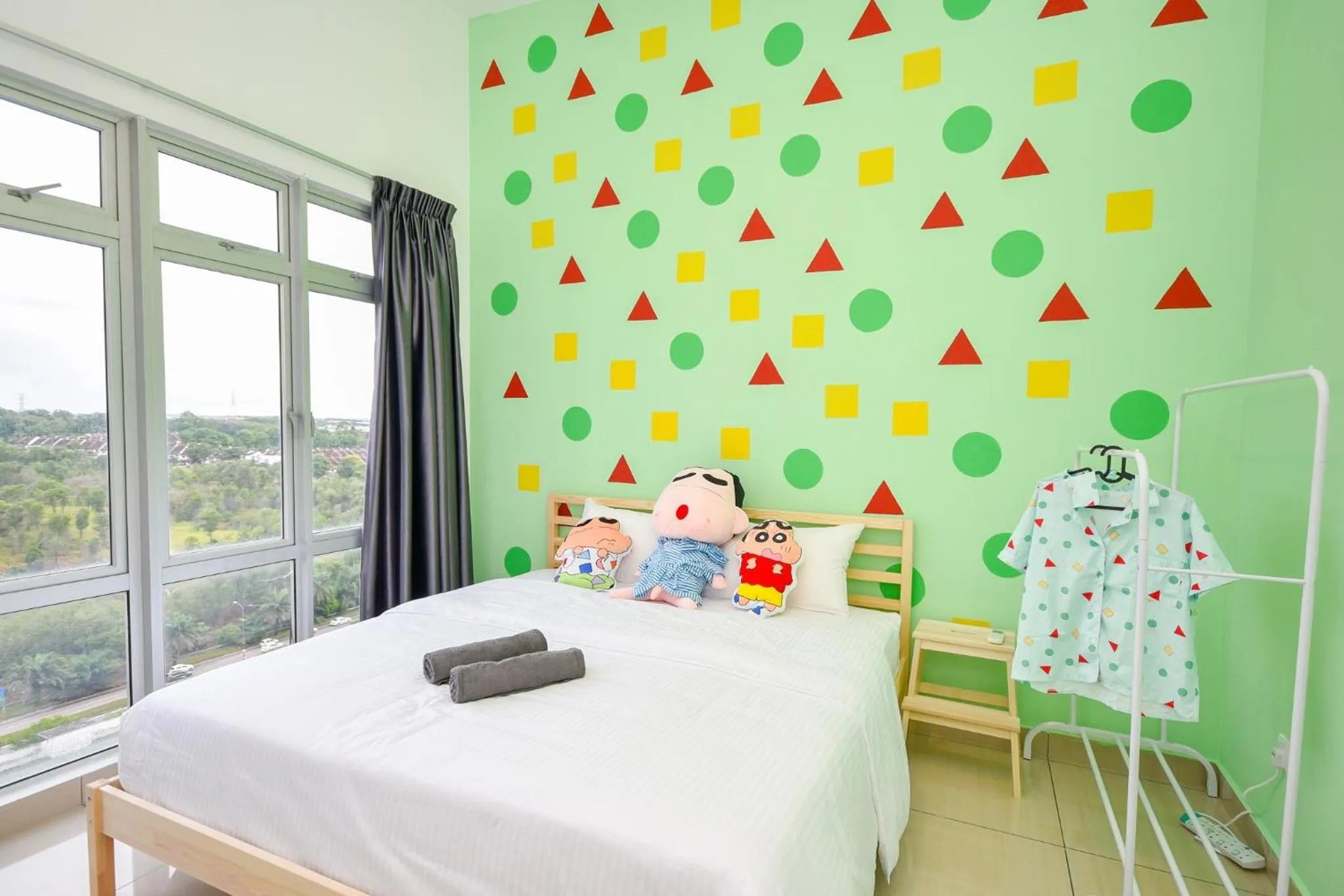 Bed in Manhattan Theme Suite by Nest Home at Austin Heights