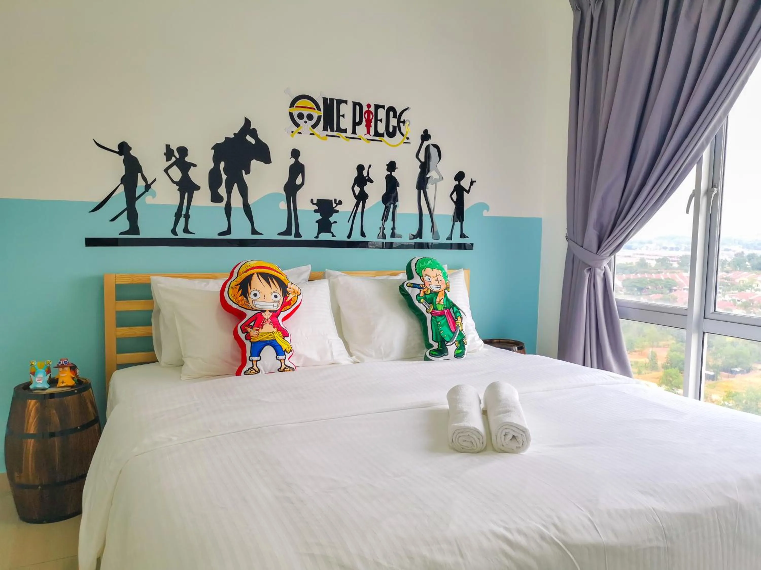 Bed in Manhattan Theme Suite by Nest Home at Austin Heights