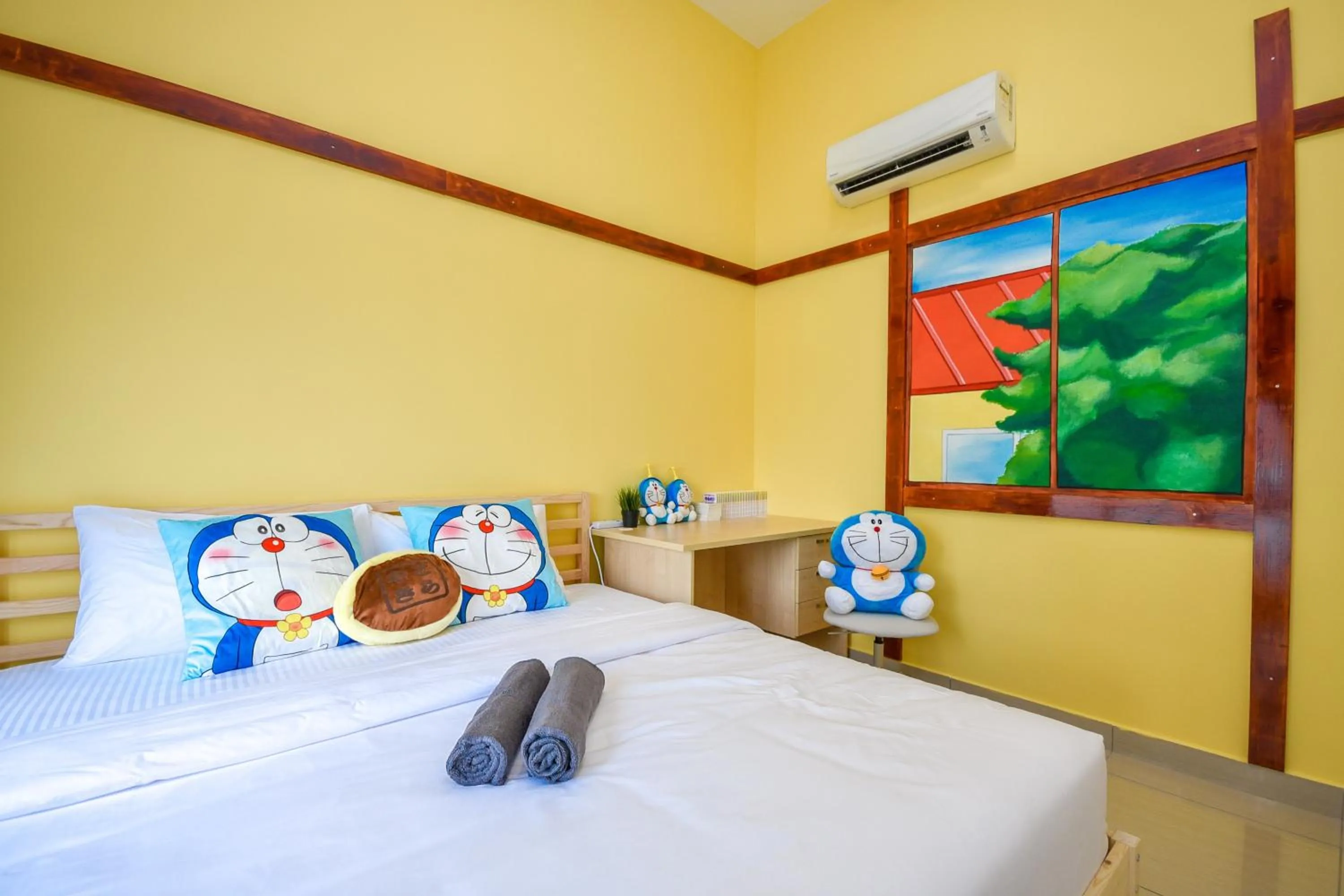 Bed in Manhattan Theme Suite by Nest Home at Austin Heights