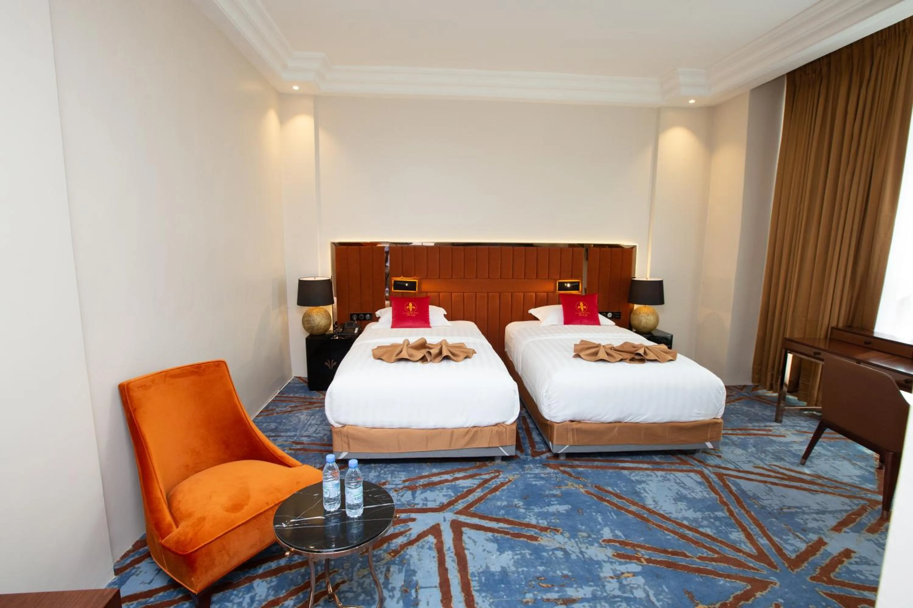 Bed in Hôtel Fleur de Lys Point E