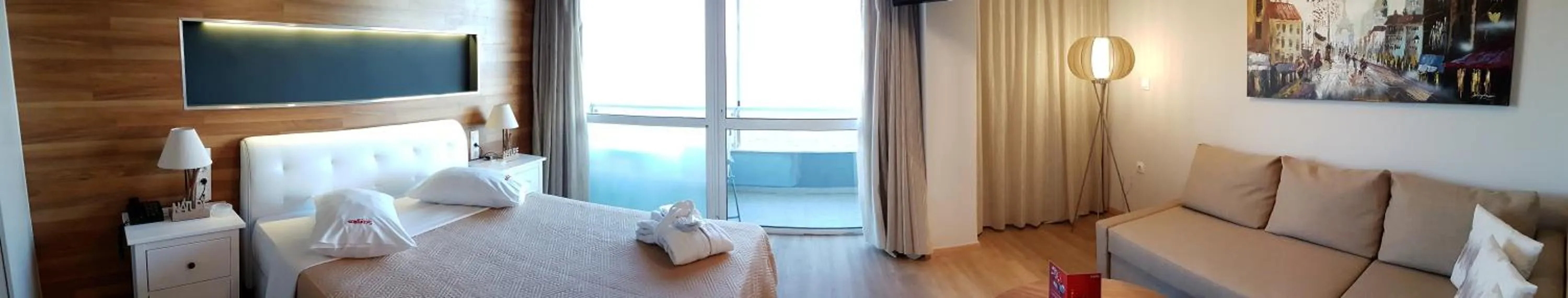 Bed in Scorpios Sea Side Hotel