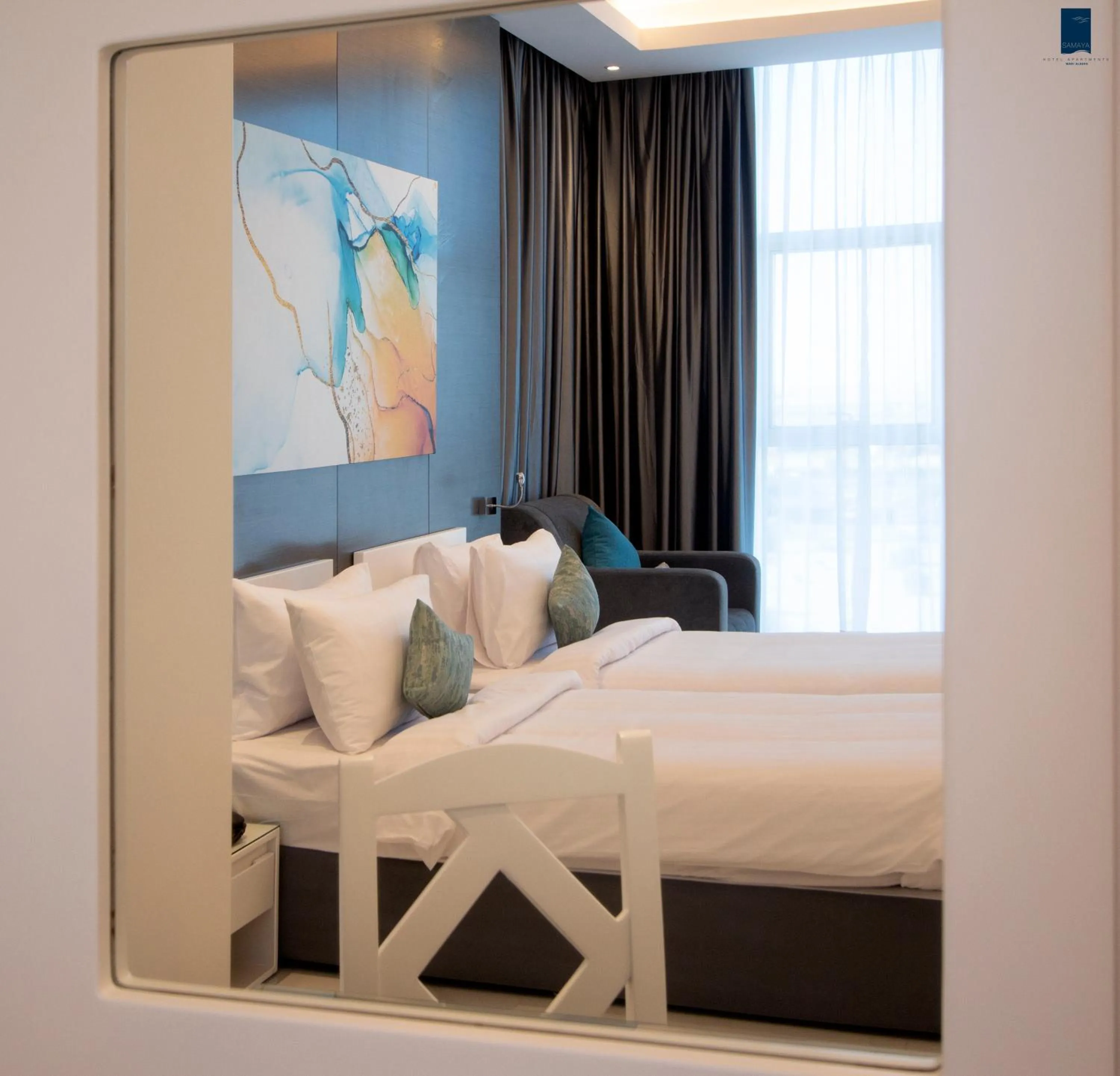 Bed in Samaya Hotel Apartment Dubai