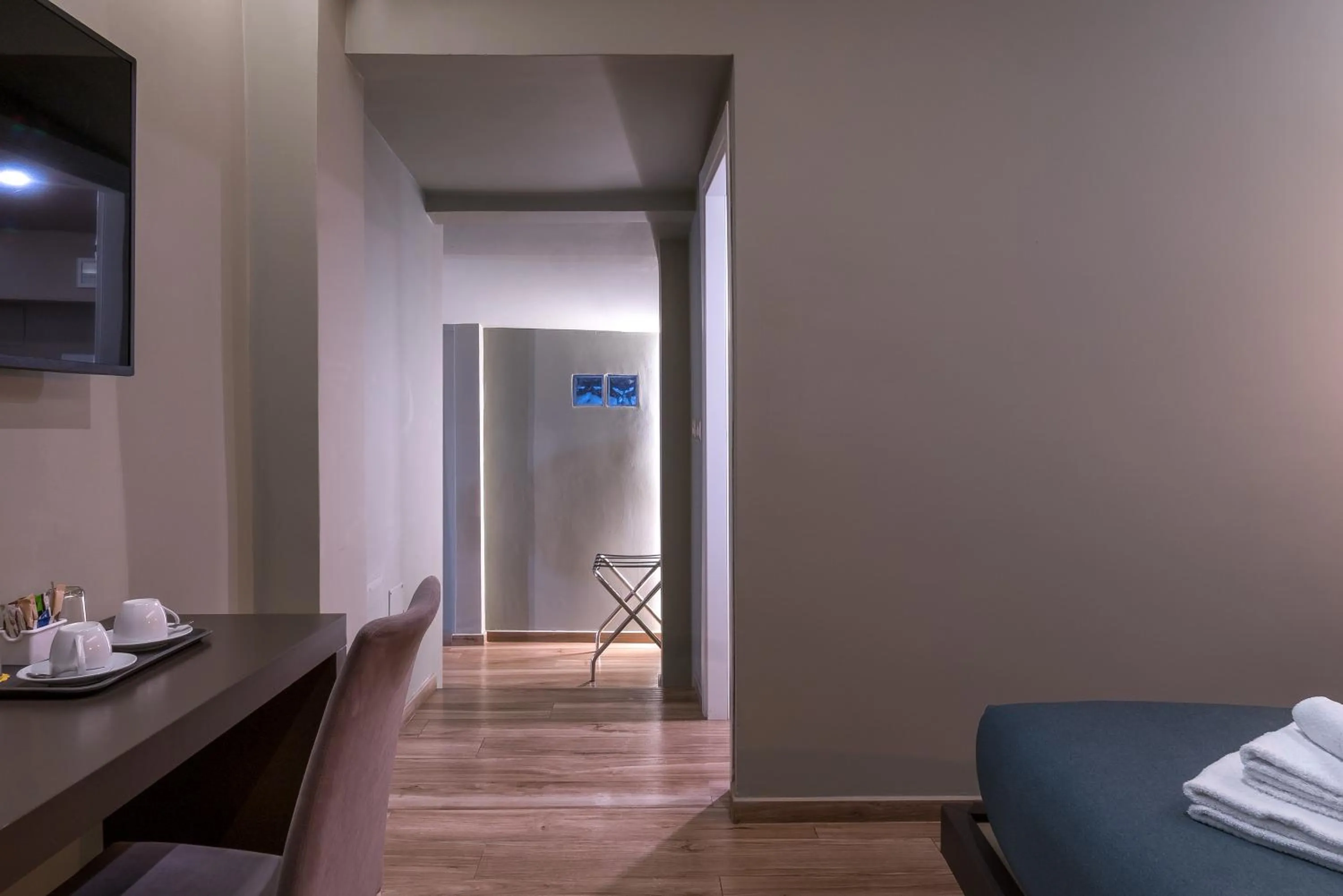 Bed in GOGO` Petit Hotel