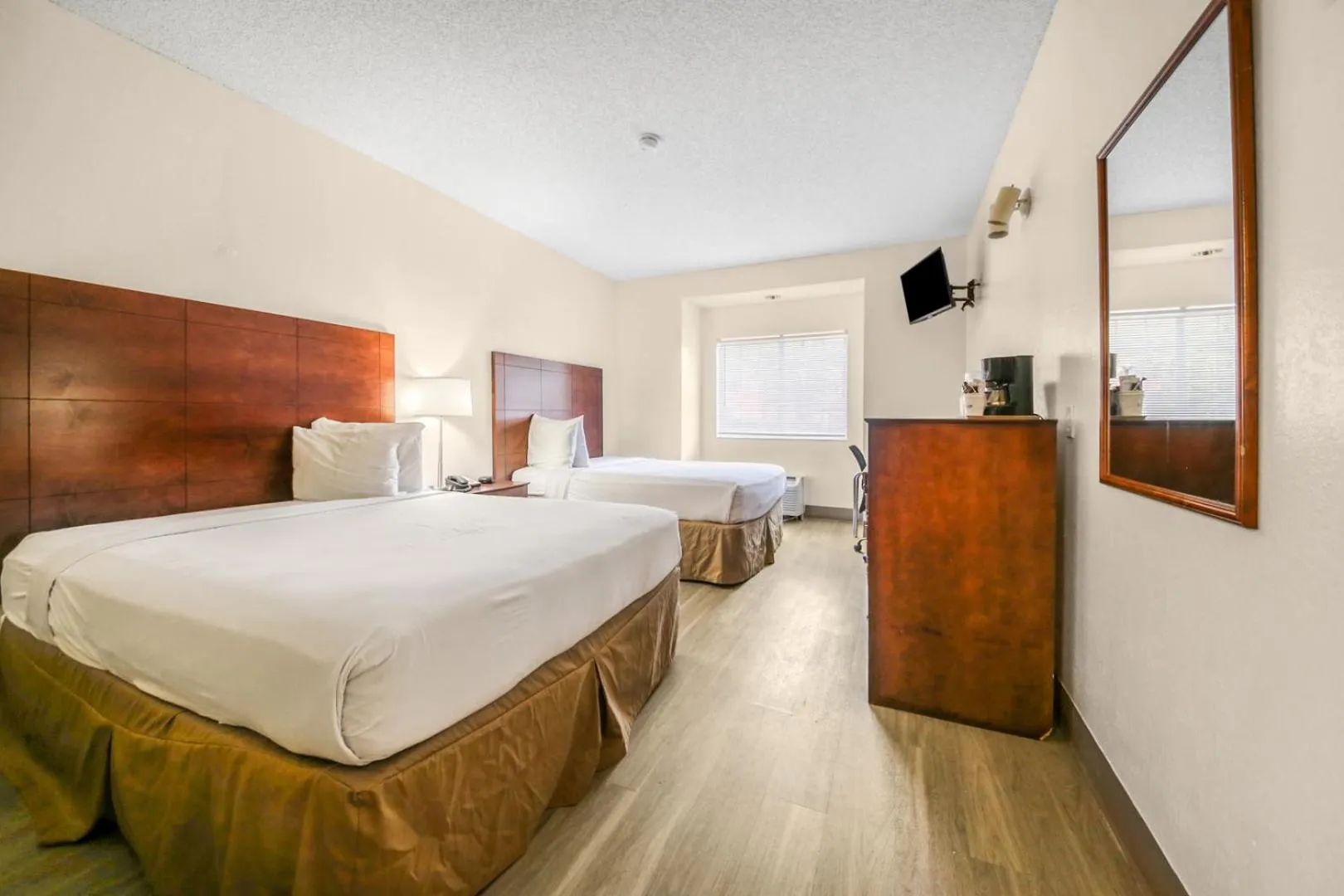 Photo of the whole room, Bed in Baymont by Wyndham Orlando-International Dr-Universal Blvd