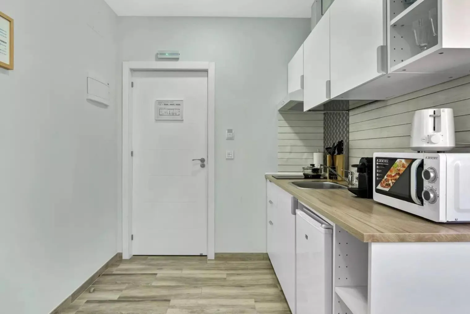 Kitchen or kitchenette in Umihouse apartamentos centro Alicante