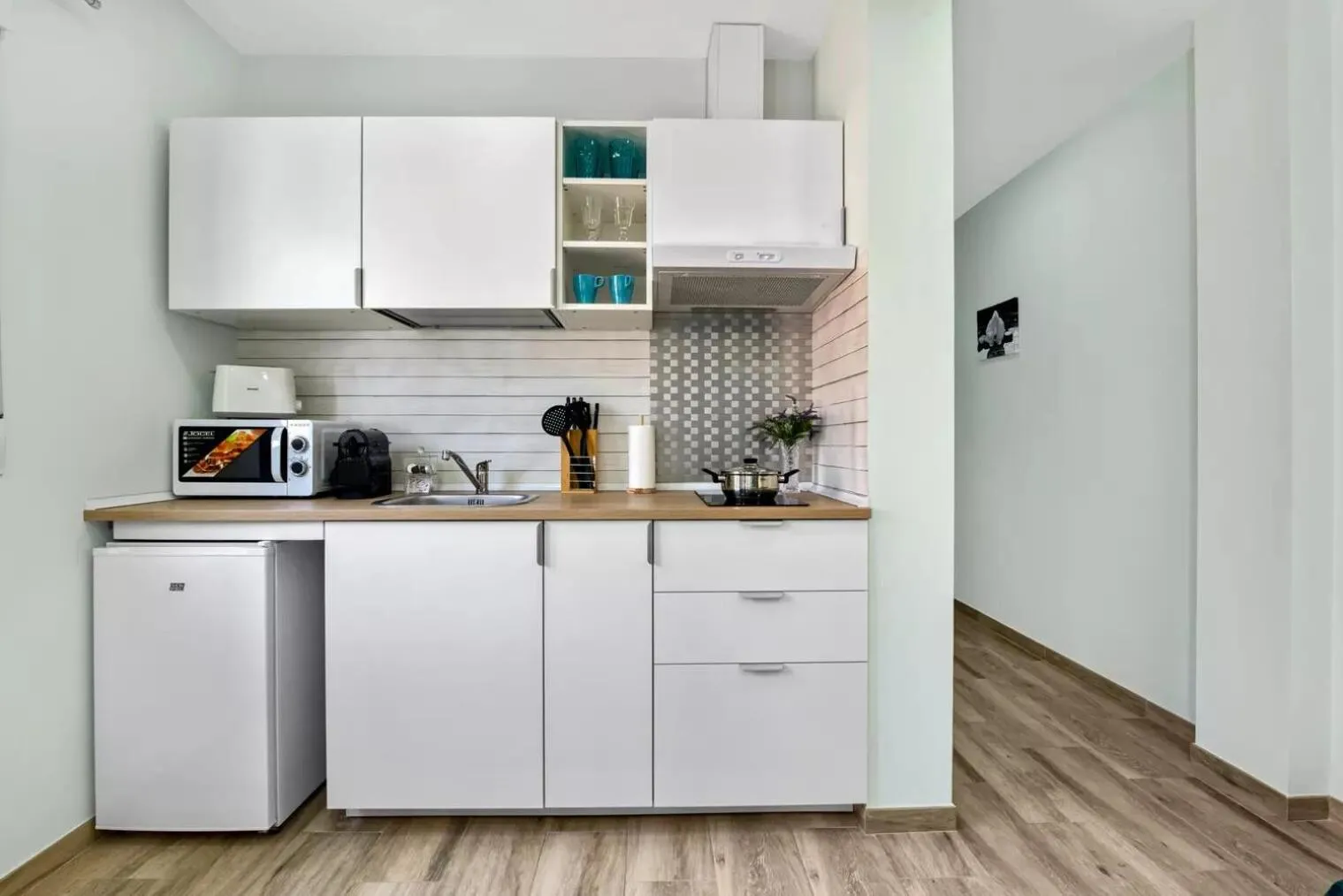 Kitchen or kitchenette in Umihouse apartamentos centro Alicante